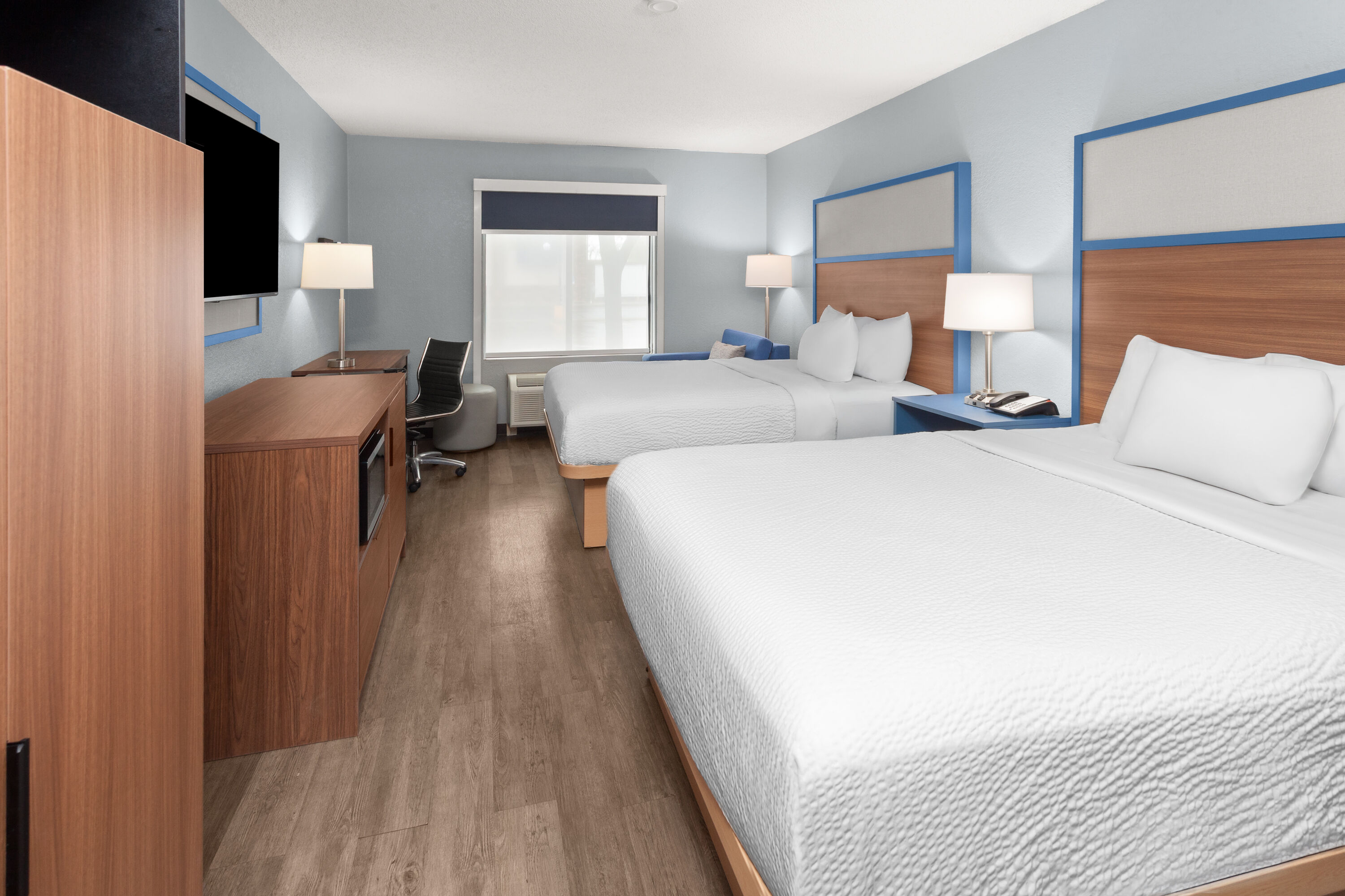 Guest room at the AmericInn by Wyndham Reedsburg in Reedsburg, Wisconsin