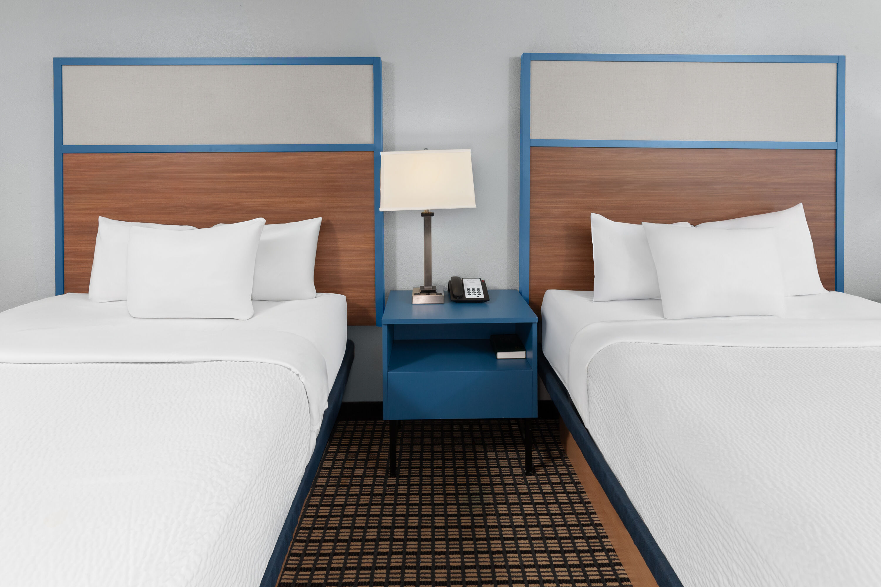 Guest room at the AmericInn by Wyndham Reedsburg in Reedsburg, Wisconsin