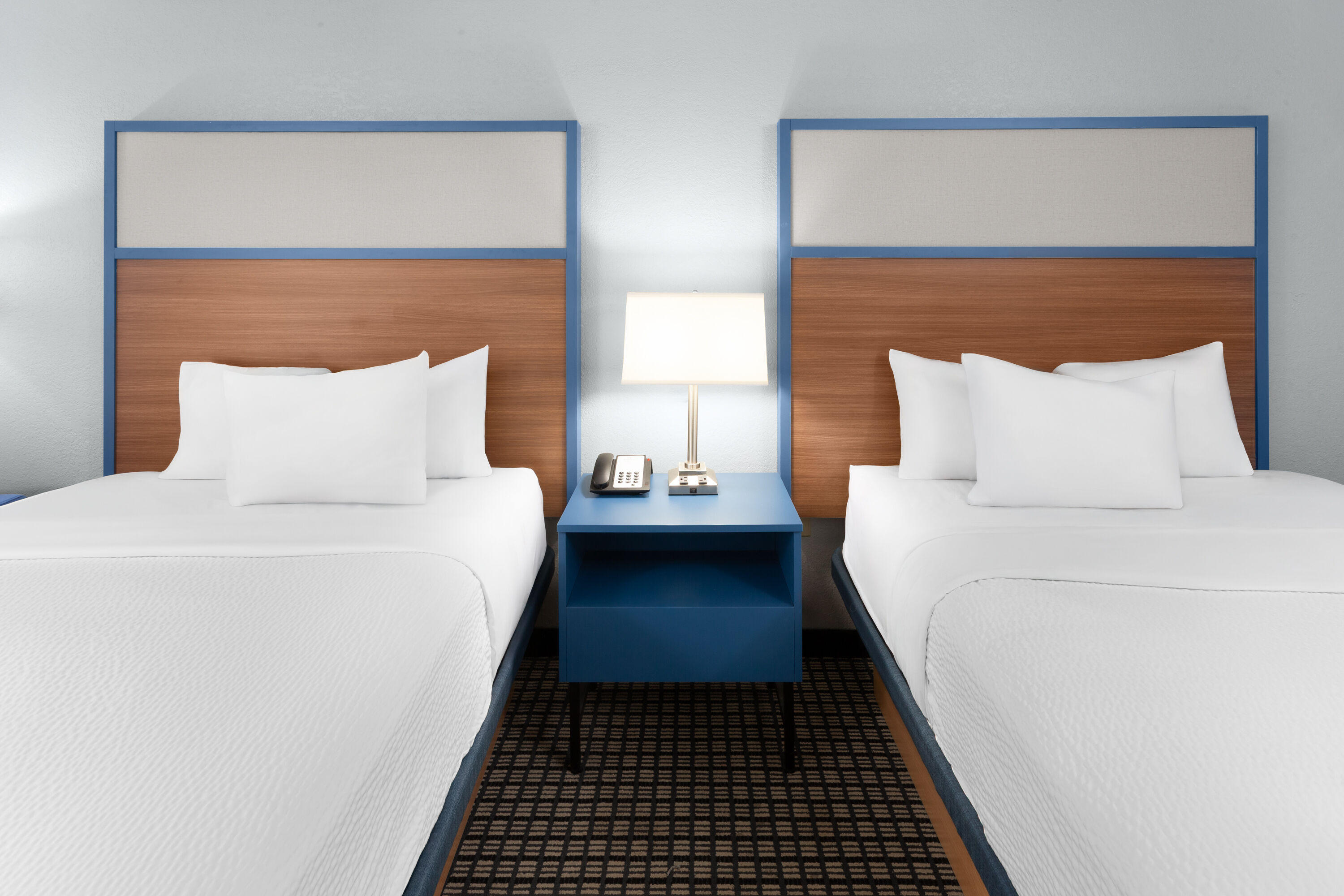 Guest room at the AmericInn by Wyndham Reedsburg in Reedsburg, Wisconsin