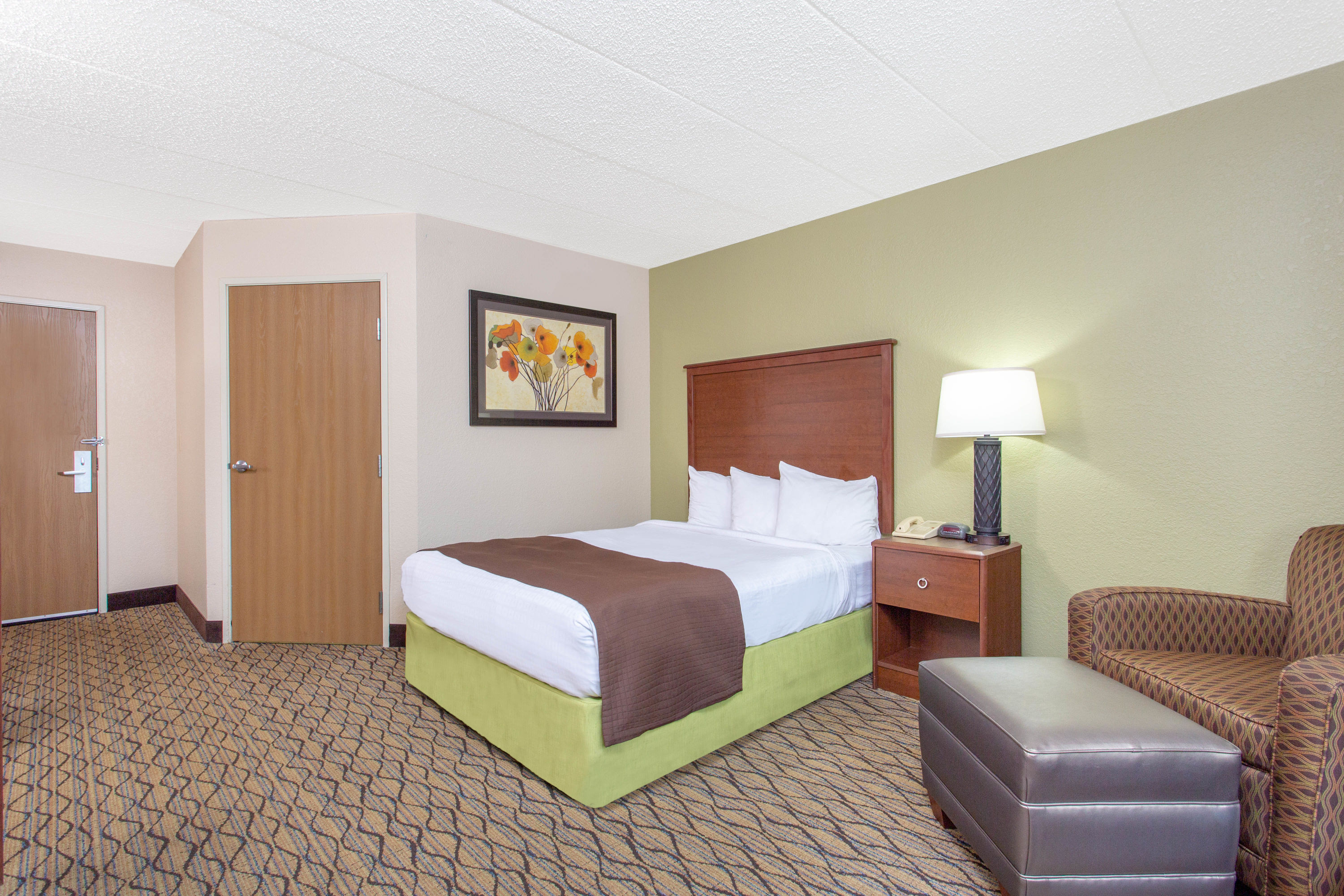 Guest room at the AmericInn by Wyndham Sheboygan in Sheboygan, Wisconsin