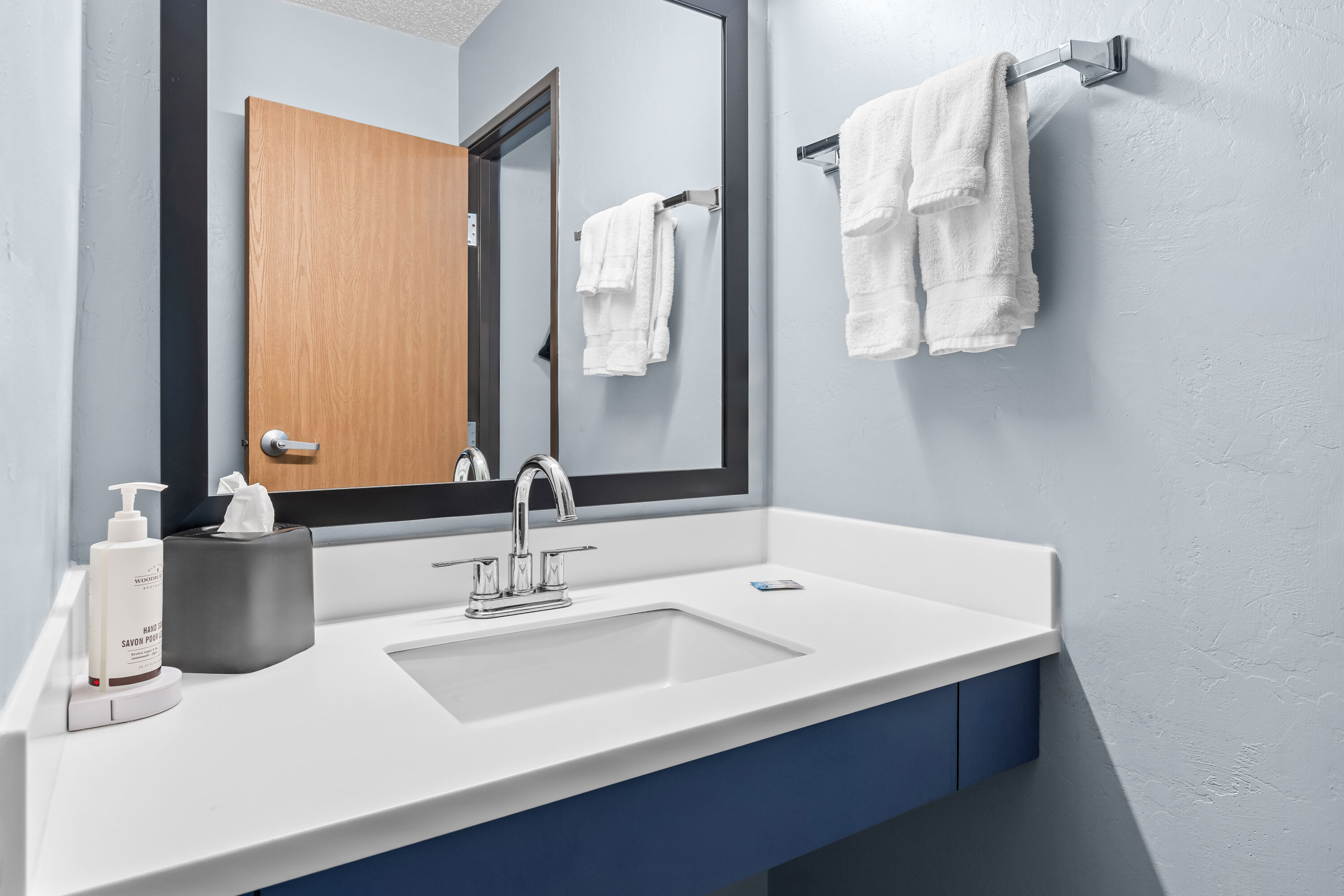 Guest room bath at the AmericInn by Wyndham Sturgeon Bay in Sturgeon Bay, Wisconsin