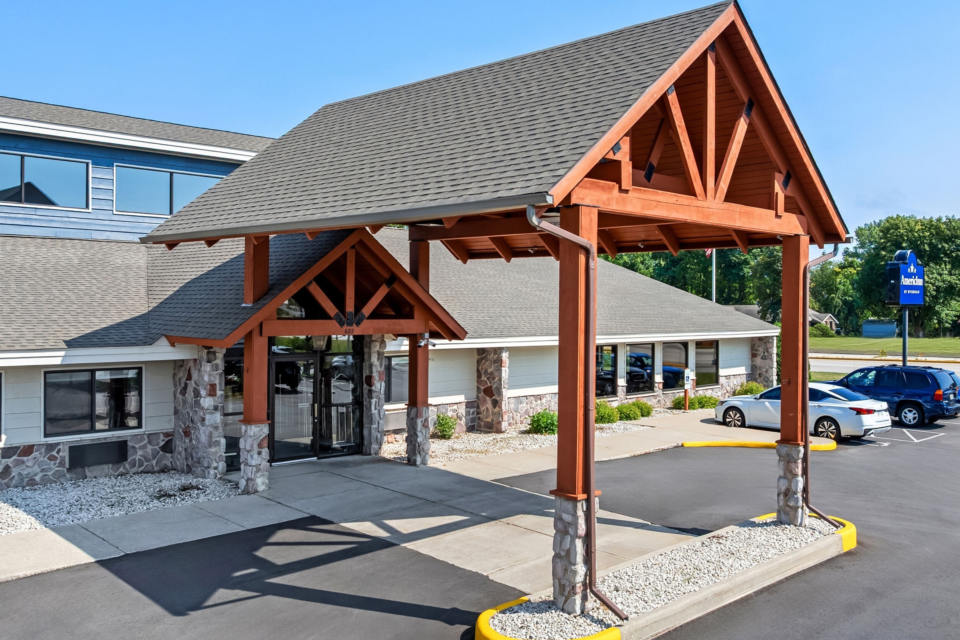 Exterior Day Image of AmericInn by Wyndham Sturgeon Bay hotel in Sturgeon Bay, Wisconsin