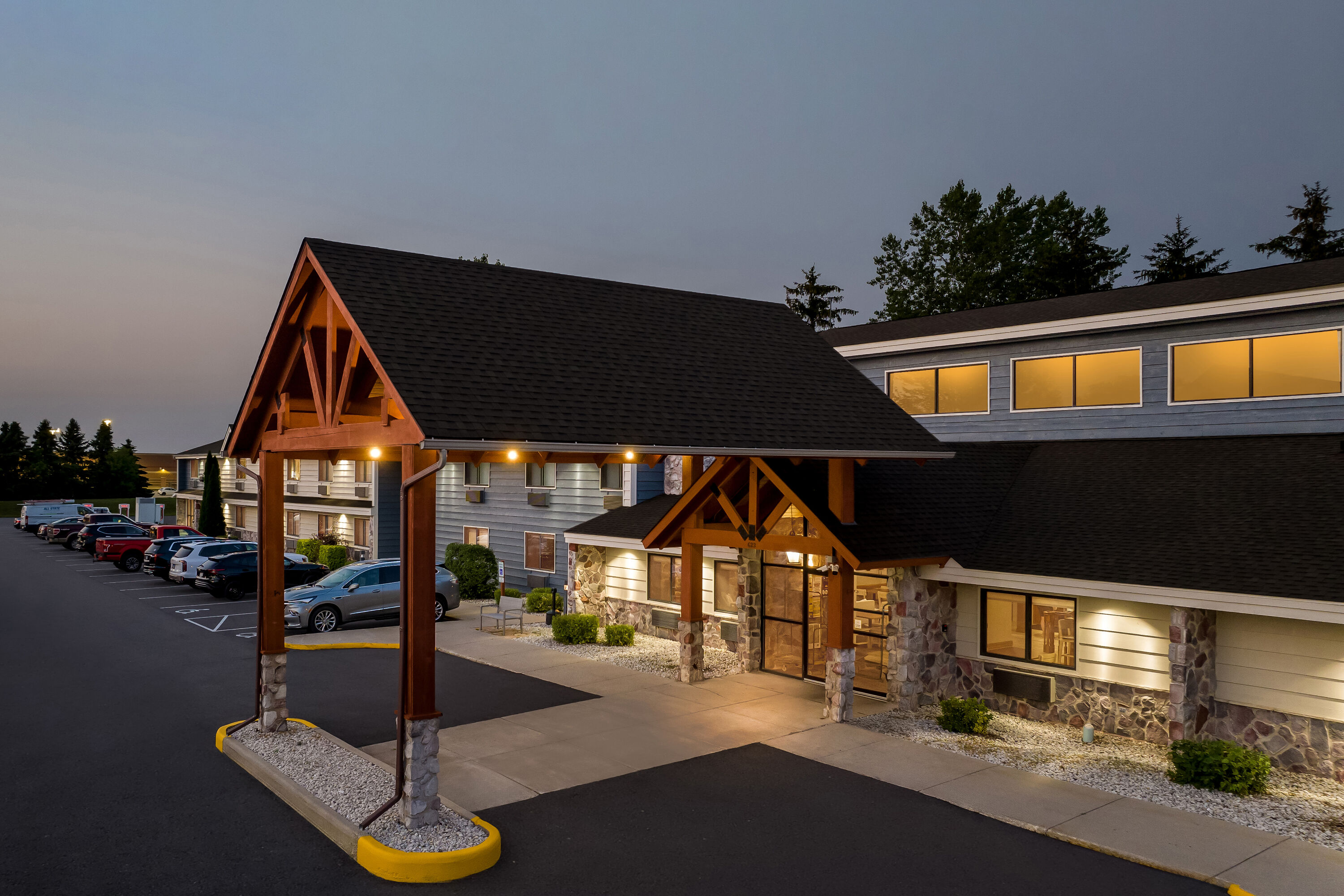 Exterior Night Image of AmericInn by Wyndham Sturgeon Bay hotel in Sturgeon Bay, Wisconsin