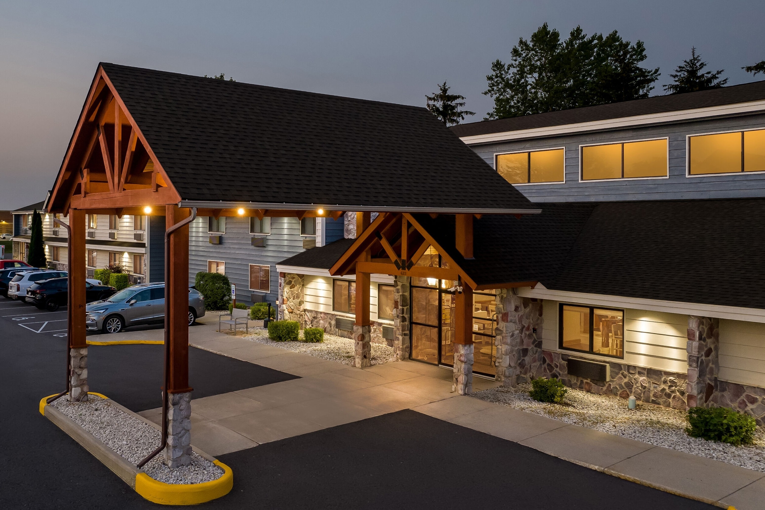 Exterior Night Image of AmericInn by Wyndham Sturgeon Bay hotel in Sturgeon Bay, Wisconsin