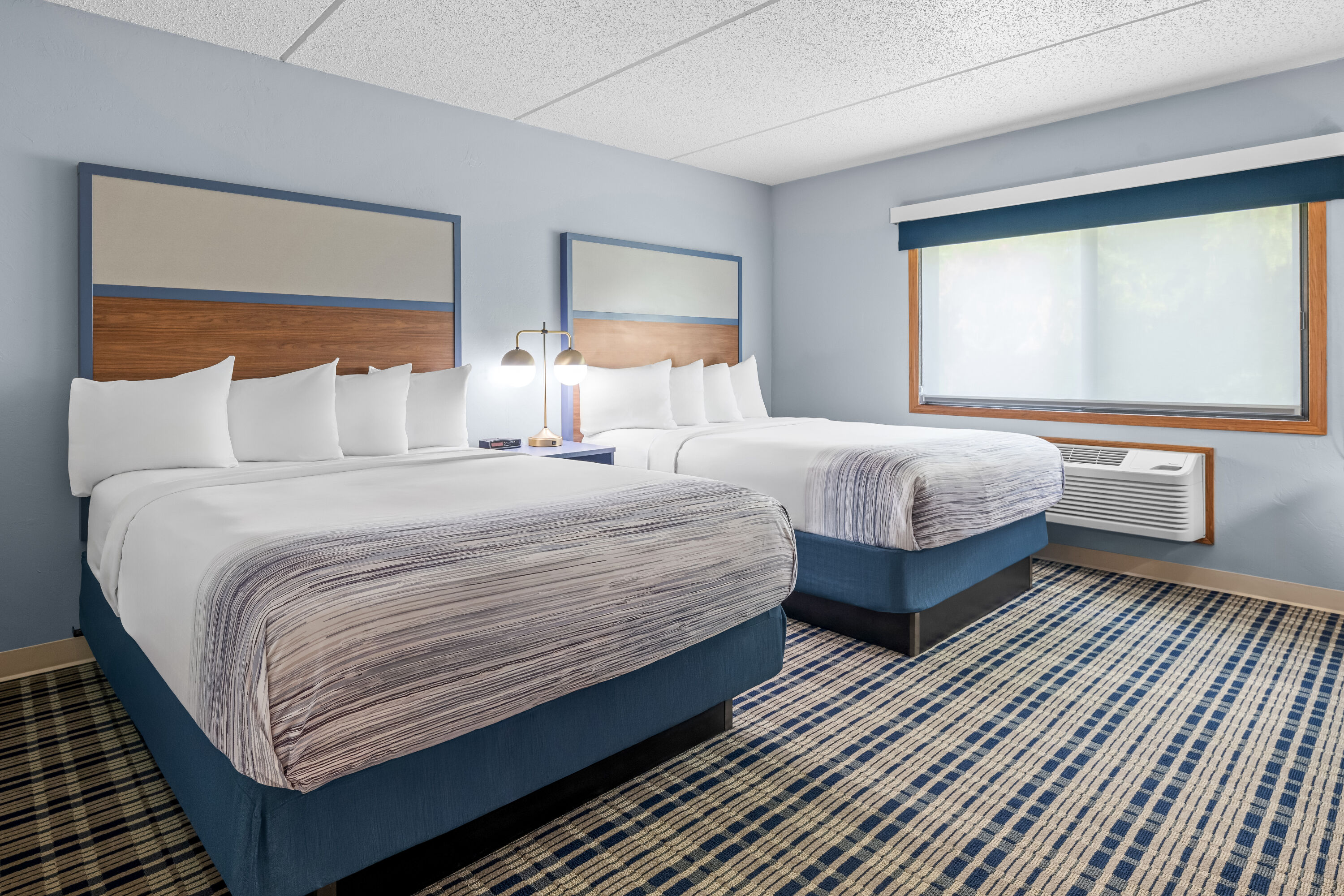 Double bed guest room at the AmericInn by Wyndham Sturgeon Bay in Sturgeon Bay, Wisconsin