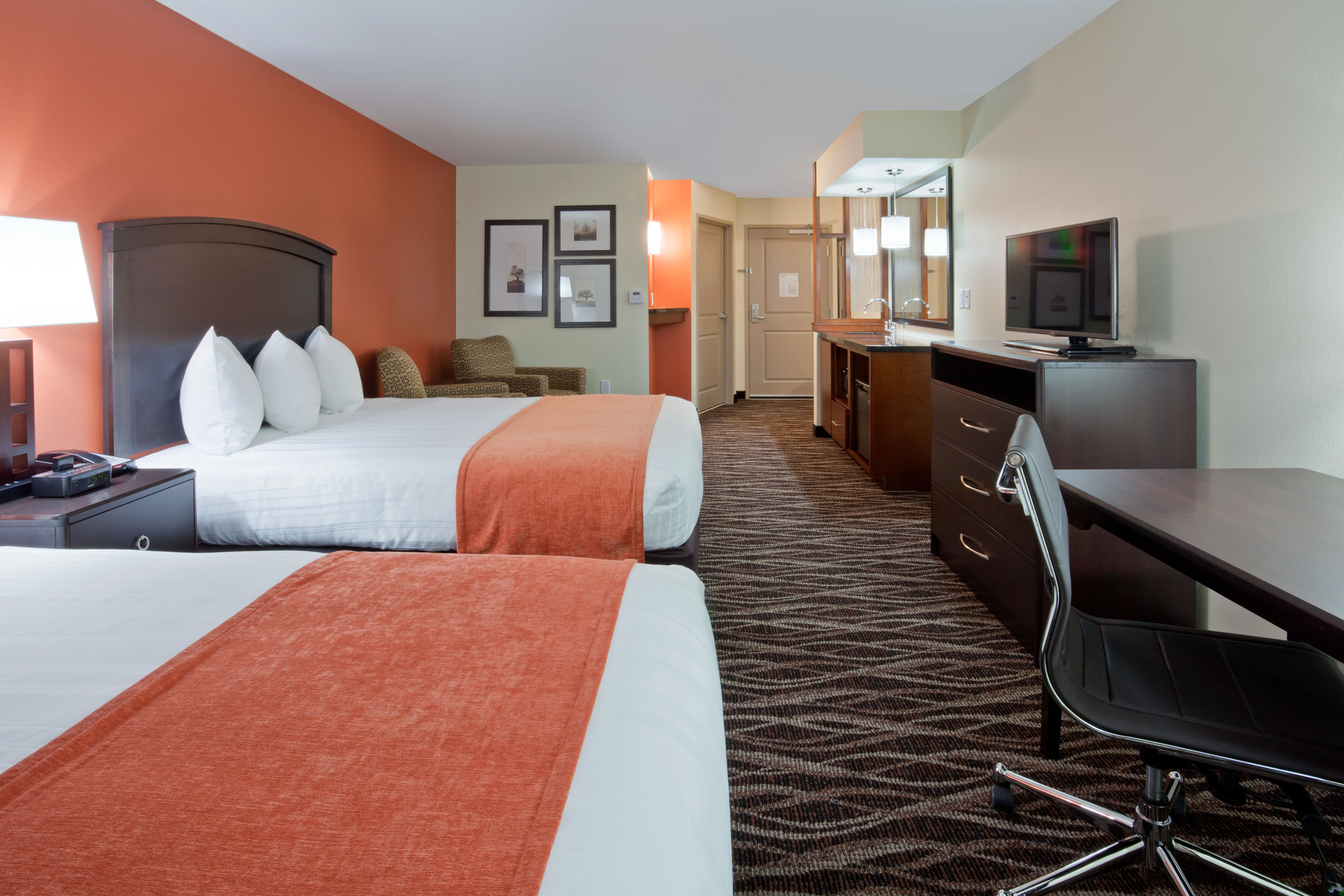 Guest room at the AmericInn by Wyndham Waupun in Waupun, Wisconsin