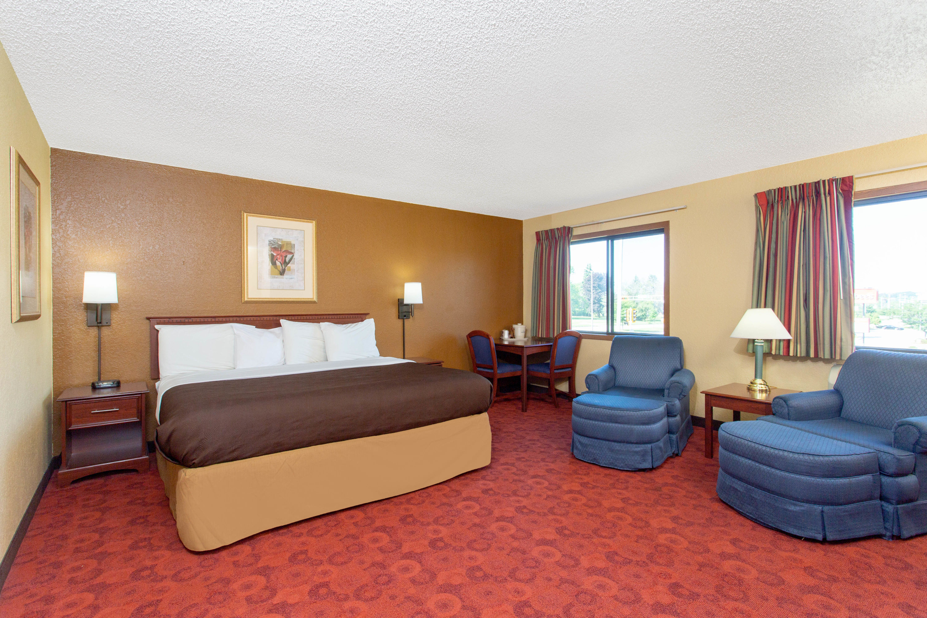 Guest room at the AmericInn by Wyndham West Bend in West Bend, Wisconsin