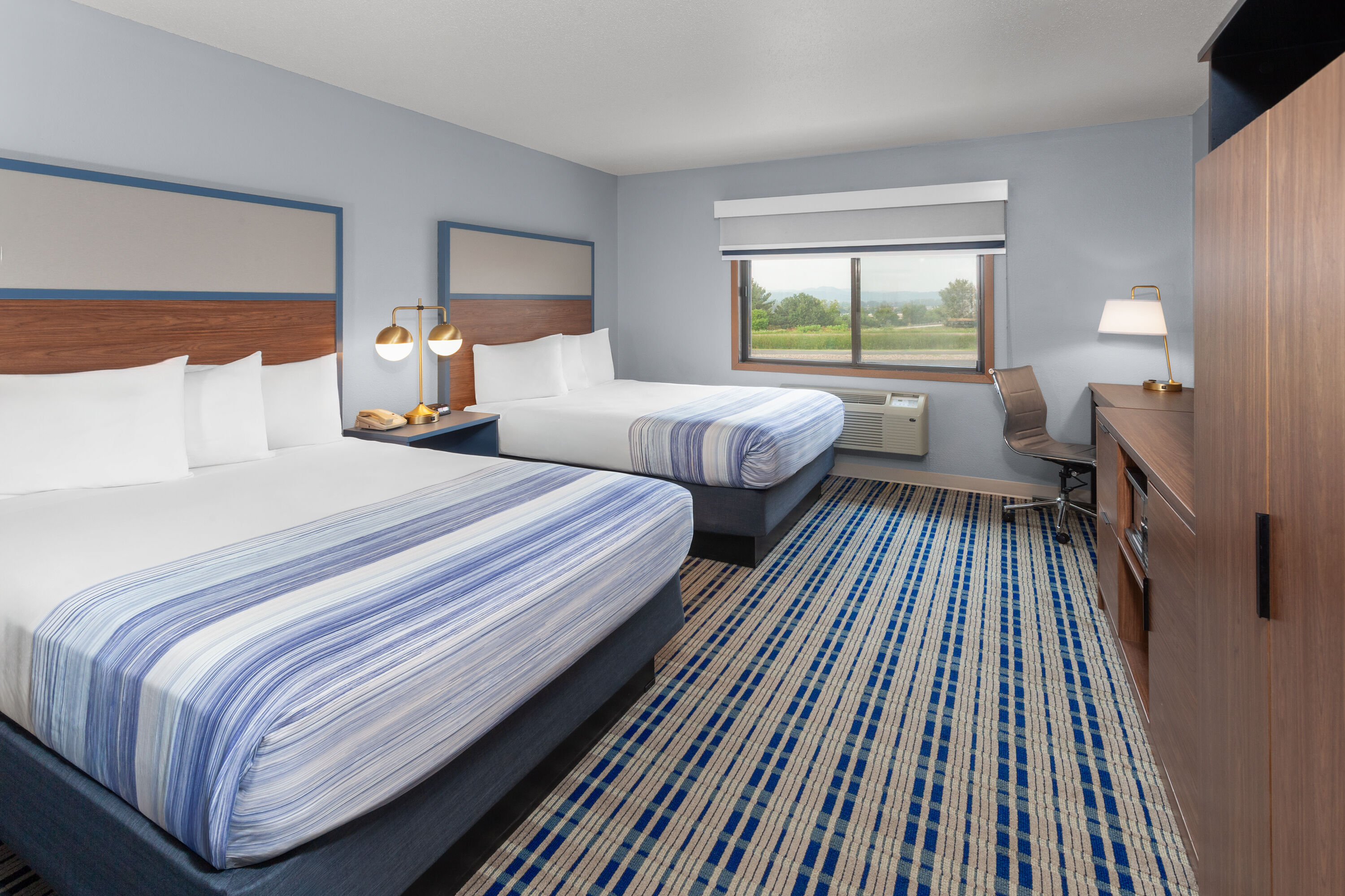 Guest room at the AmericInn by Wyndham West Salem in West Salem, Wisconsin