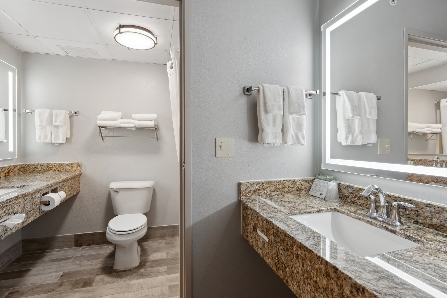 Guest room bath at the AmericInn by Wyndham Wisconsin Dells in Wisconsin Dells, Wisconsin
