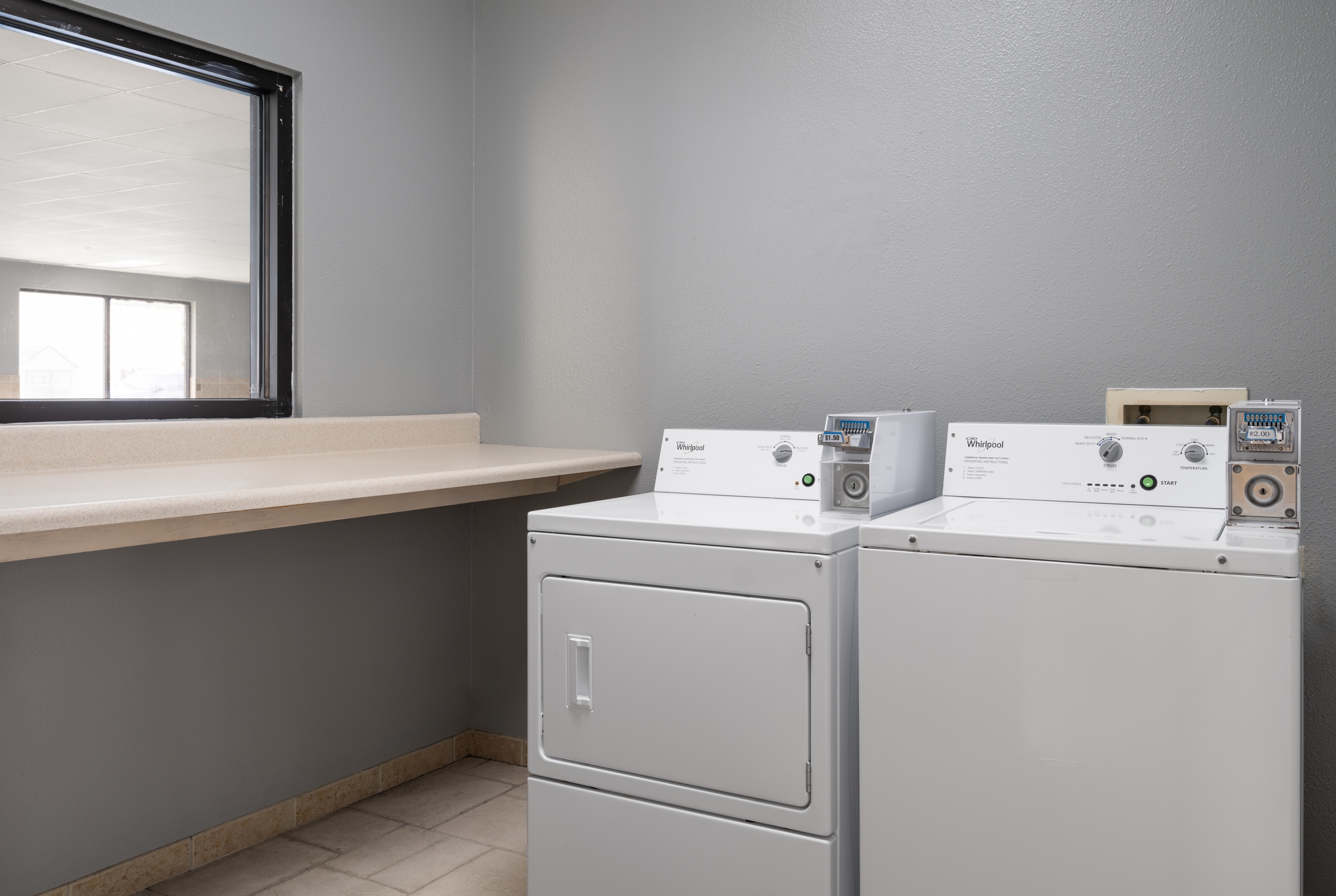 Laundry facilities at AmericInn by Wyndham Casper Event Center Area in Casper, Wyoming