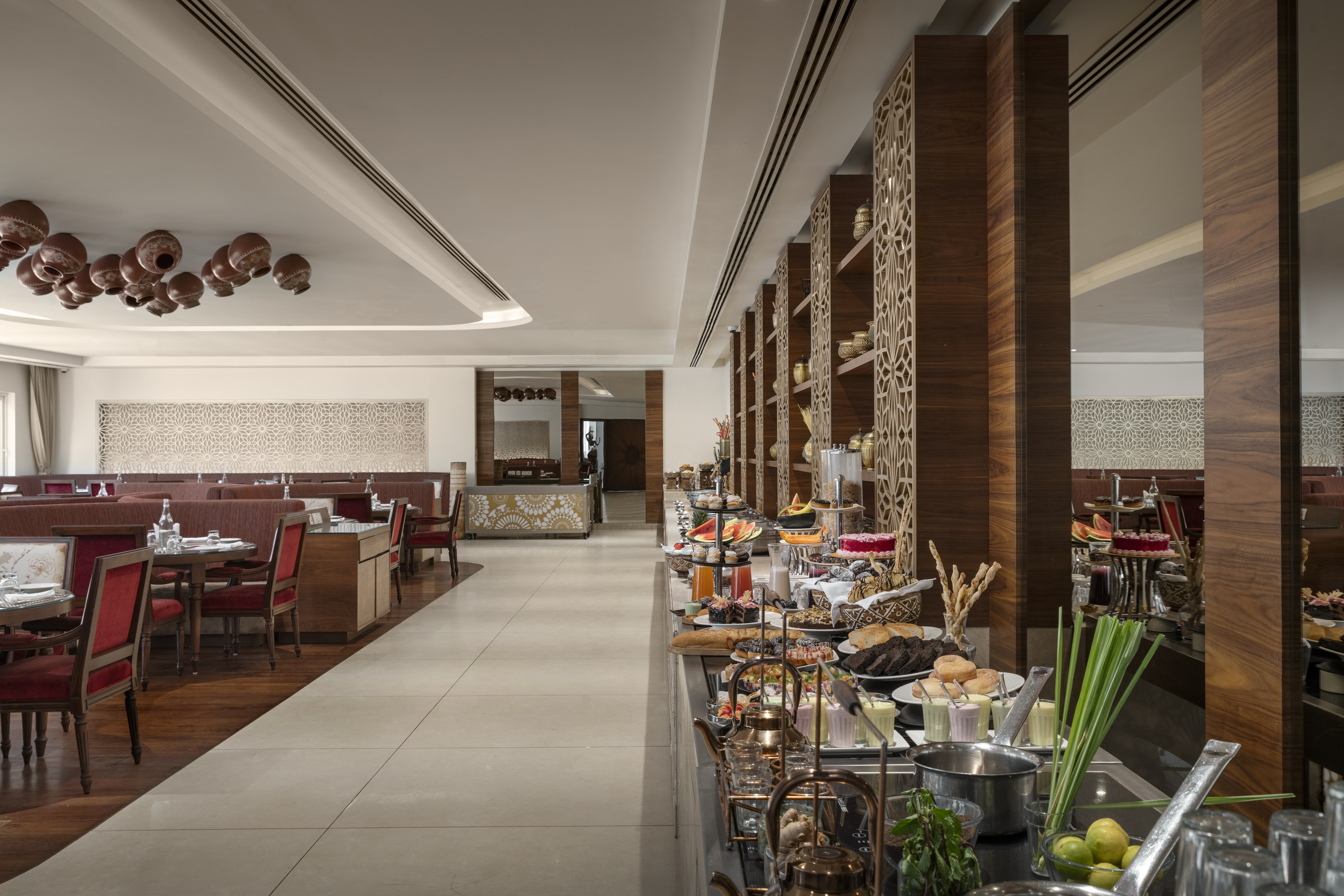Hawthorn Suites by Wyndham Dwarka restaurant breakfast area with seating in Dwarka, Other than US/Canada