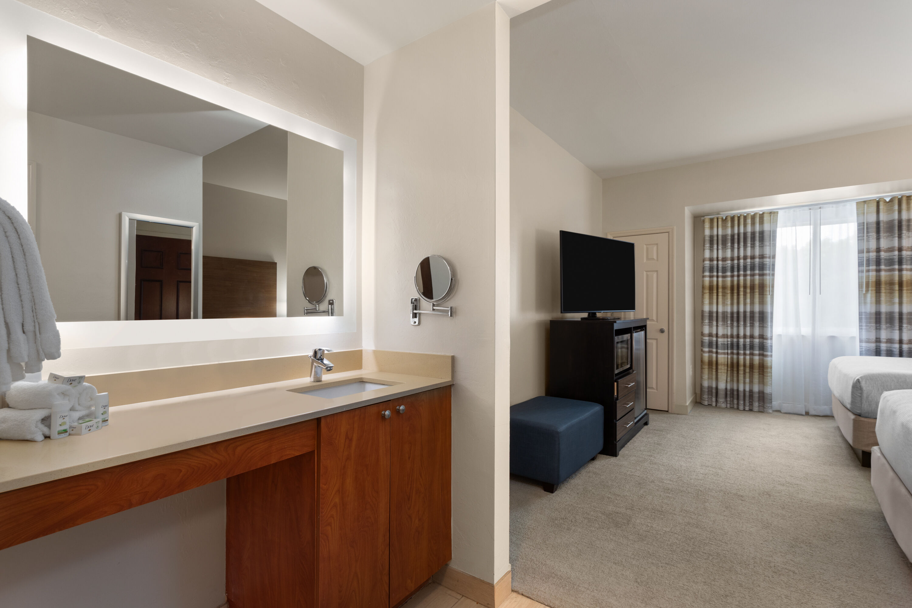 Guest room at the Hawthorn Extended Stay by Wyndham Naples in Naples, Florida