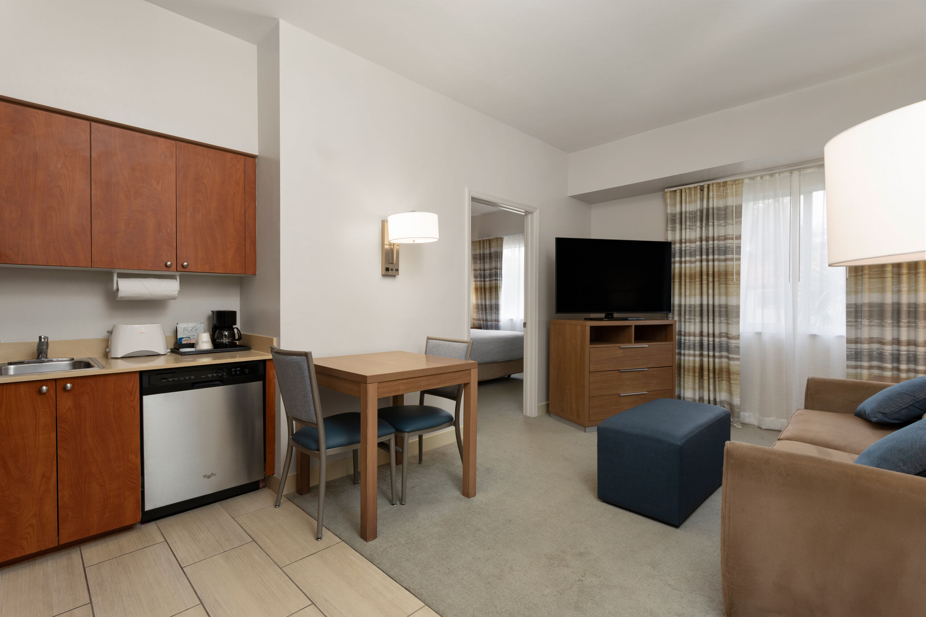 Guest room at the Hawthorn Extended Stay by Wyndham Naples in Naples, Florida