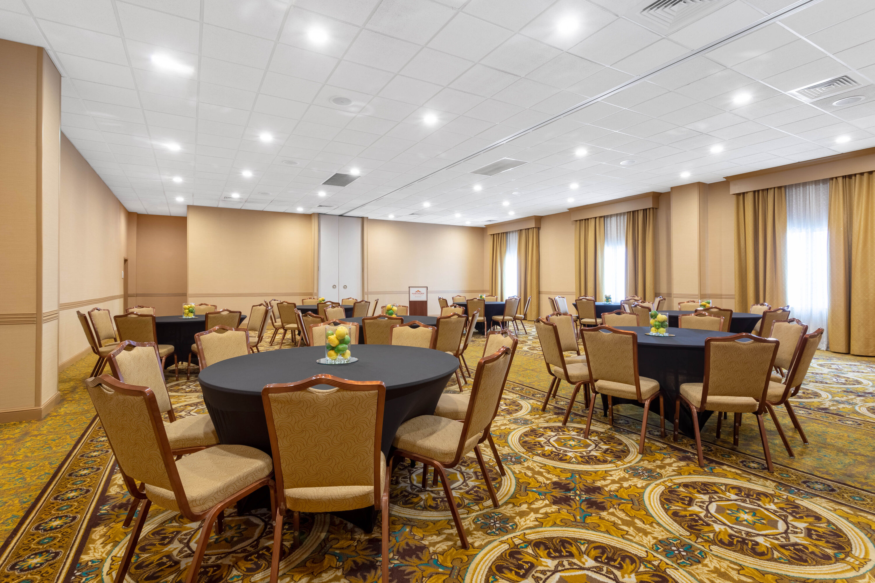 Meeting room banquet rounds at Hawthorn Extended Stay by Wyndham West Palm Beach in West Palm Beach, Florida