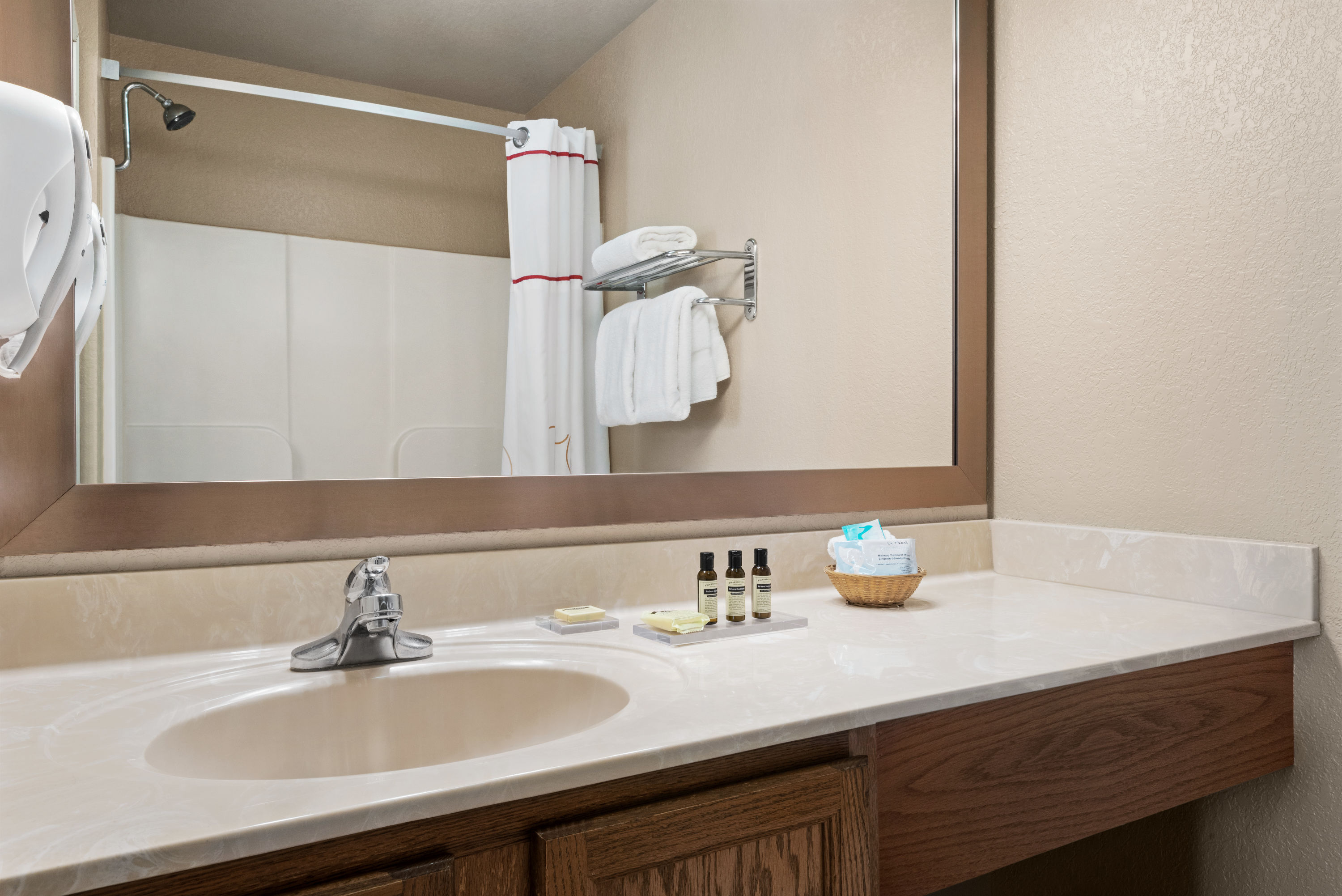 Guest room bath at the Hawthorn Extended Stay by Wyndham Decatur in Decatur, Illinois