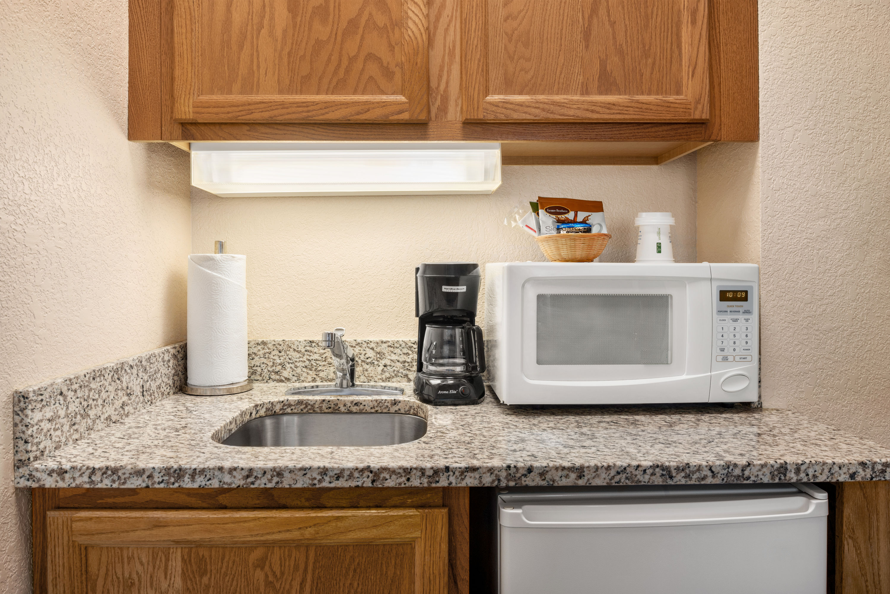 Guest room at the Hawthorn Extended Stay by Wyndham Decatur in Decatur, Illinois
