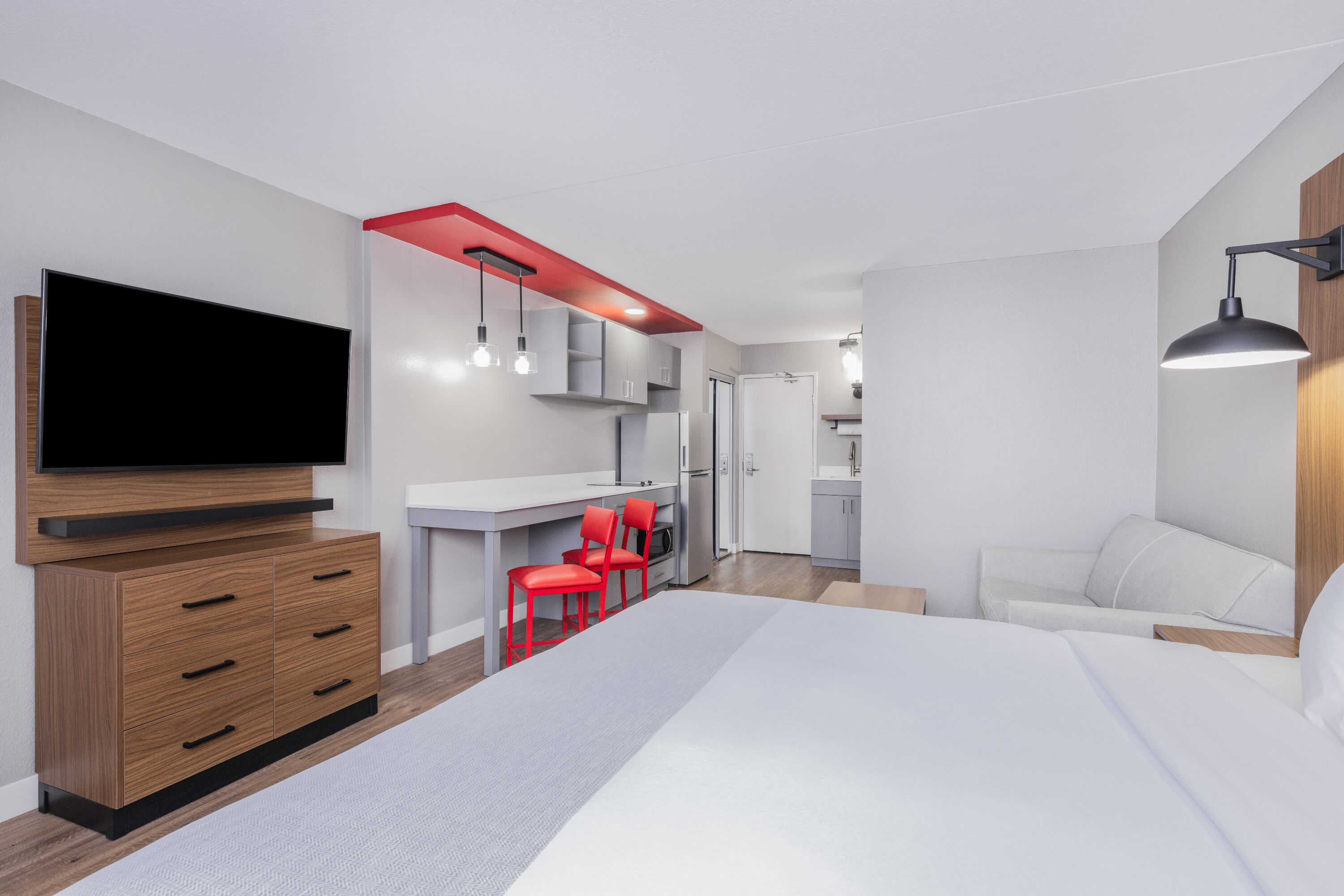 Guest room at the Hawthorn Extended Stay by Wyndham Wichita Airport in Wichita, Kansas