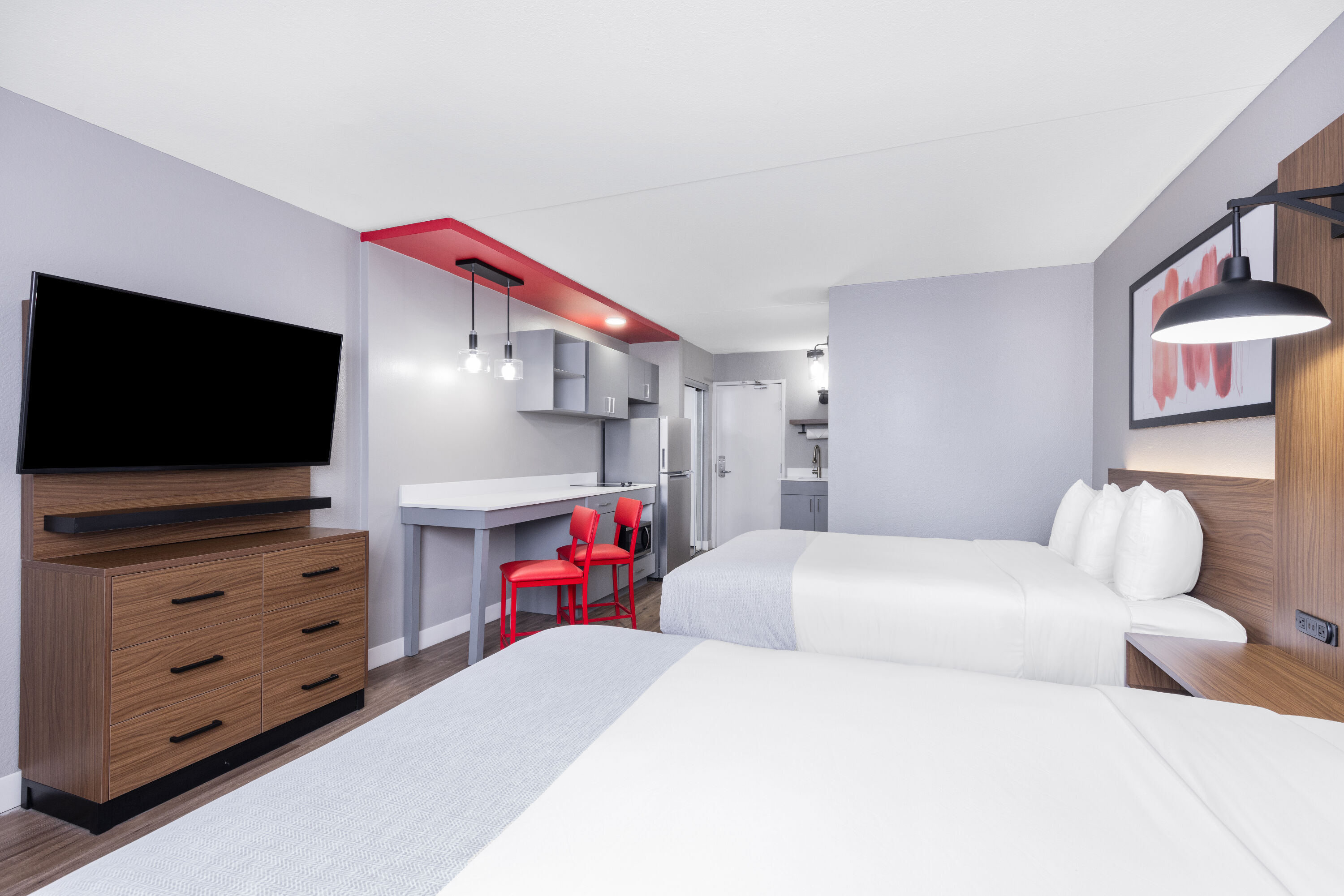 Guest room at the Hawthorn Extended Stay by Wyndham Wichita Airport in Wichita, Kansas