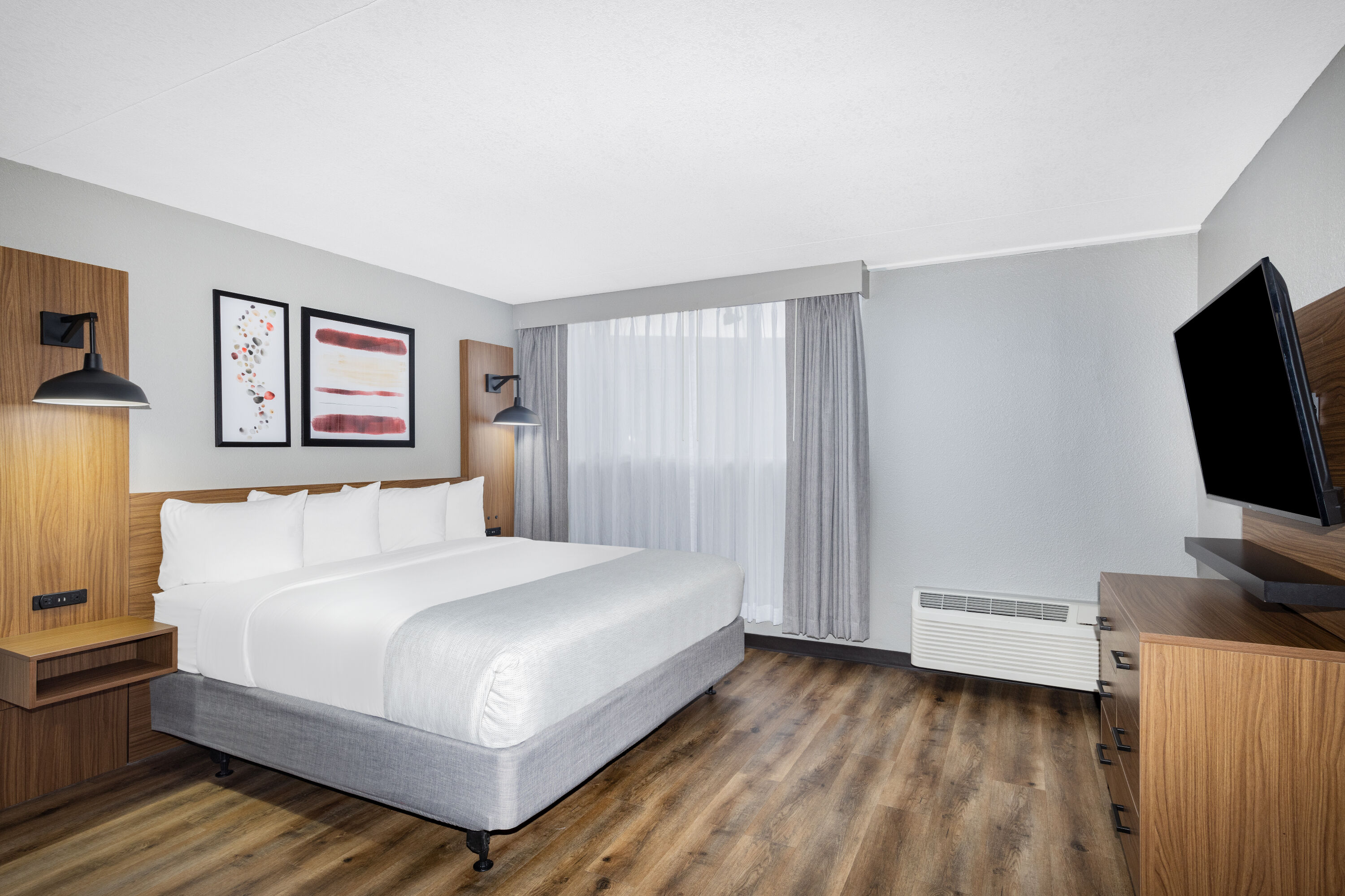 Guest room at the Hawthorn Extended Stay by Wyndham Wichita Airport in Wichita, Kansas