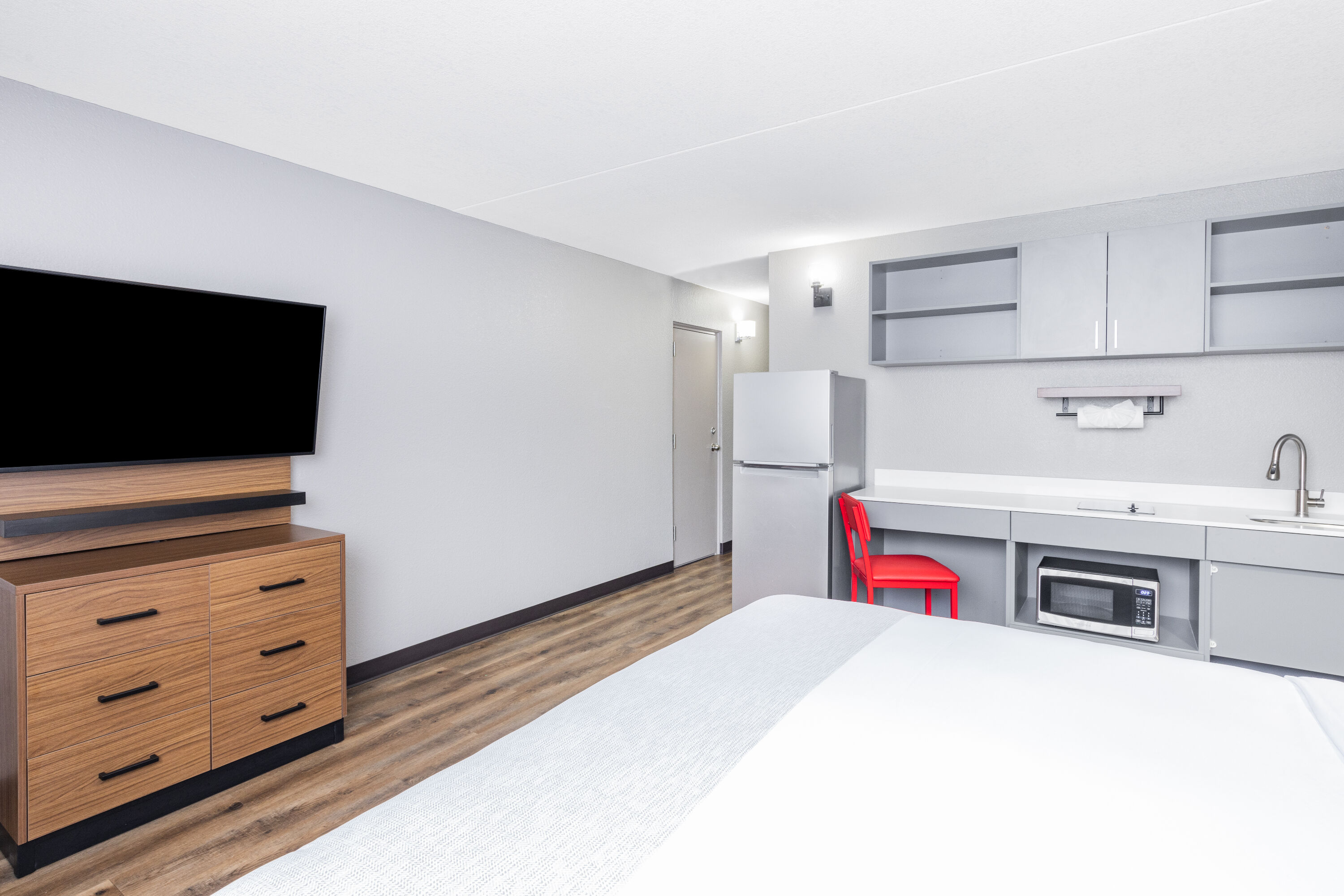 Guest room at the Hawthorn Extended Stay by Wyndham Wichita Airport in Wichita, Kansas