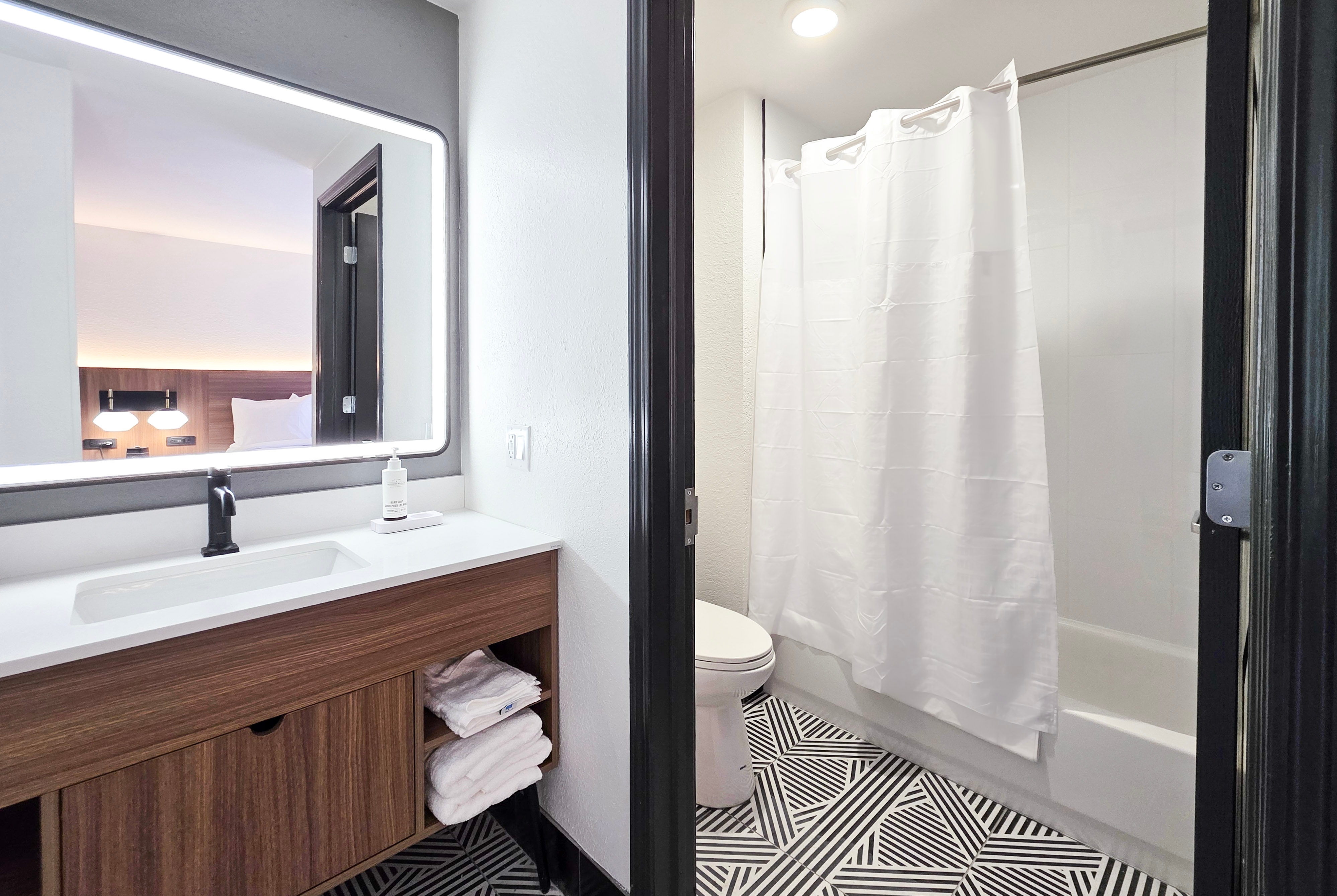 Guest room bath at the Hawthorn Extended Stay by Wyndham Auburn Hills Detroit in Auburn Hills, Michigan