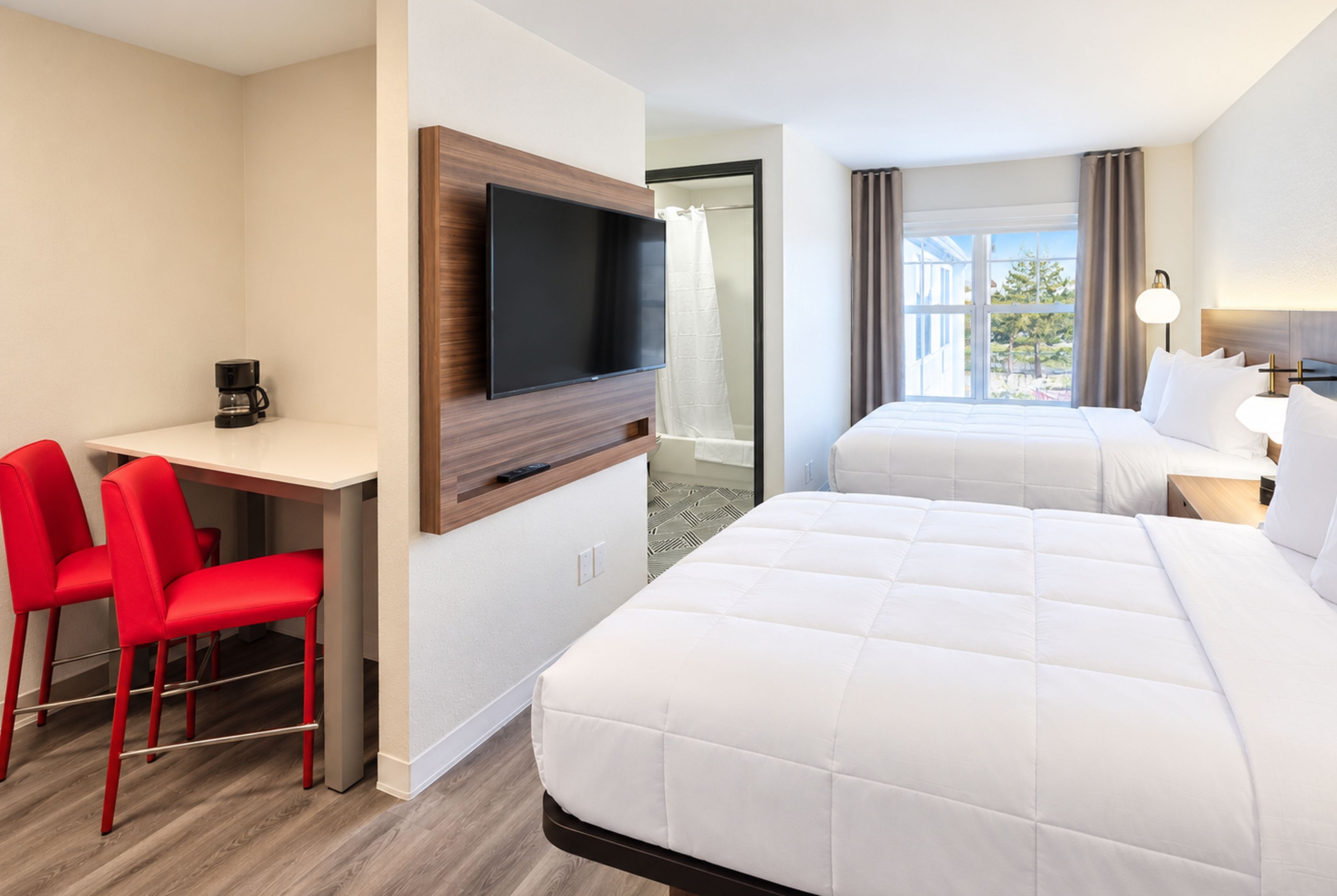 Guest room at the Hawthorn Extended Stay by Wyndham Auburn Hills Detroit in Auburn Hills, Michigan