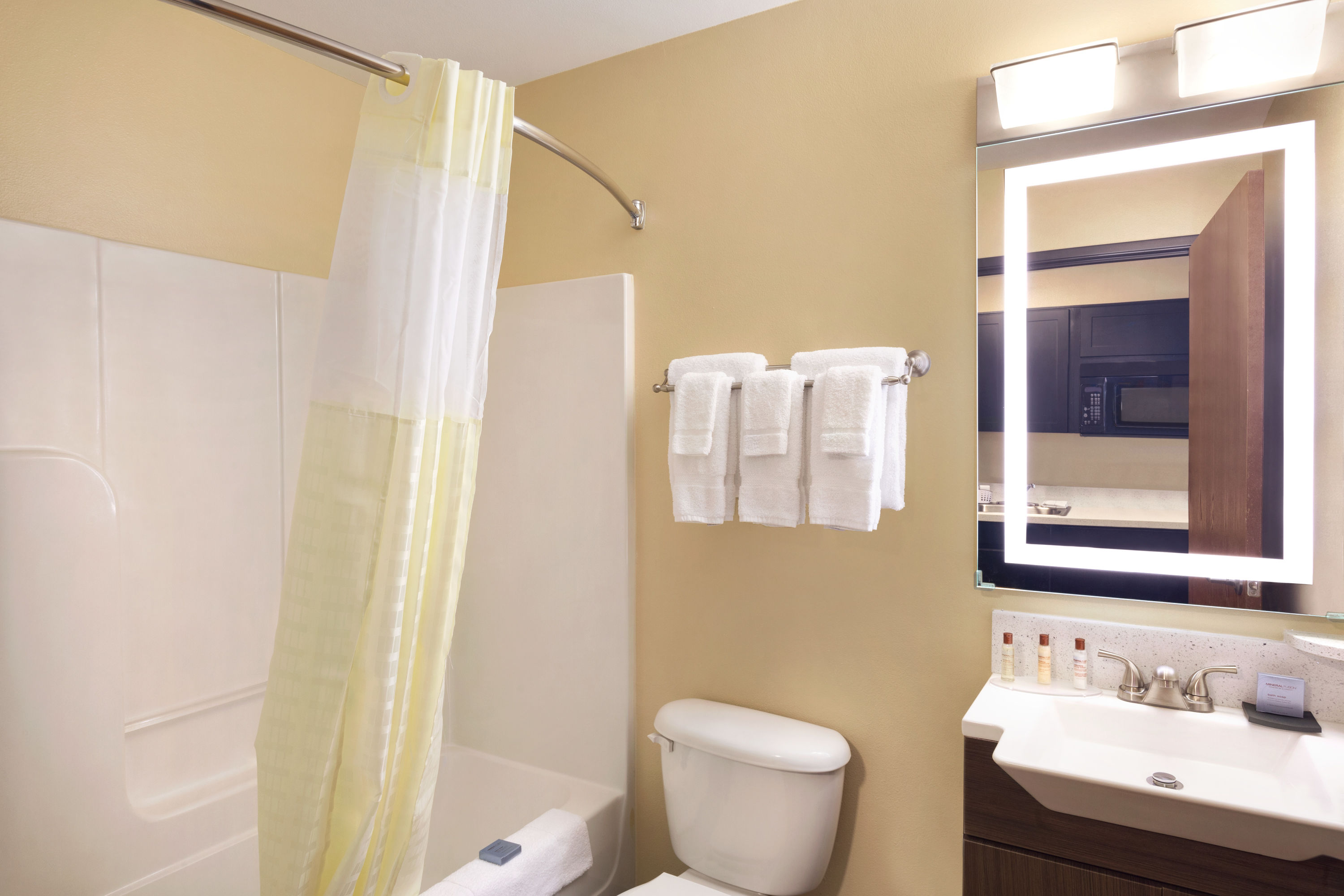 Guest room bath at the Hawthorn Extended Stay by Wyndham Saint Robert in Saint Robert, Missouri