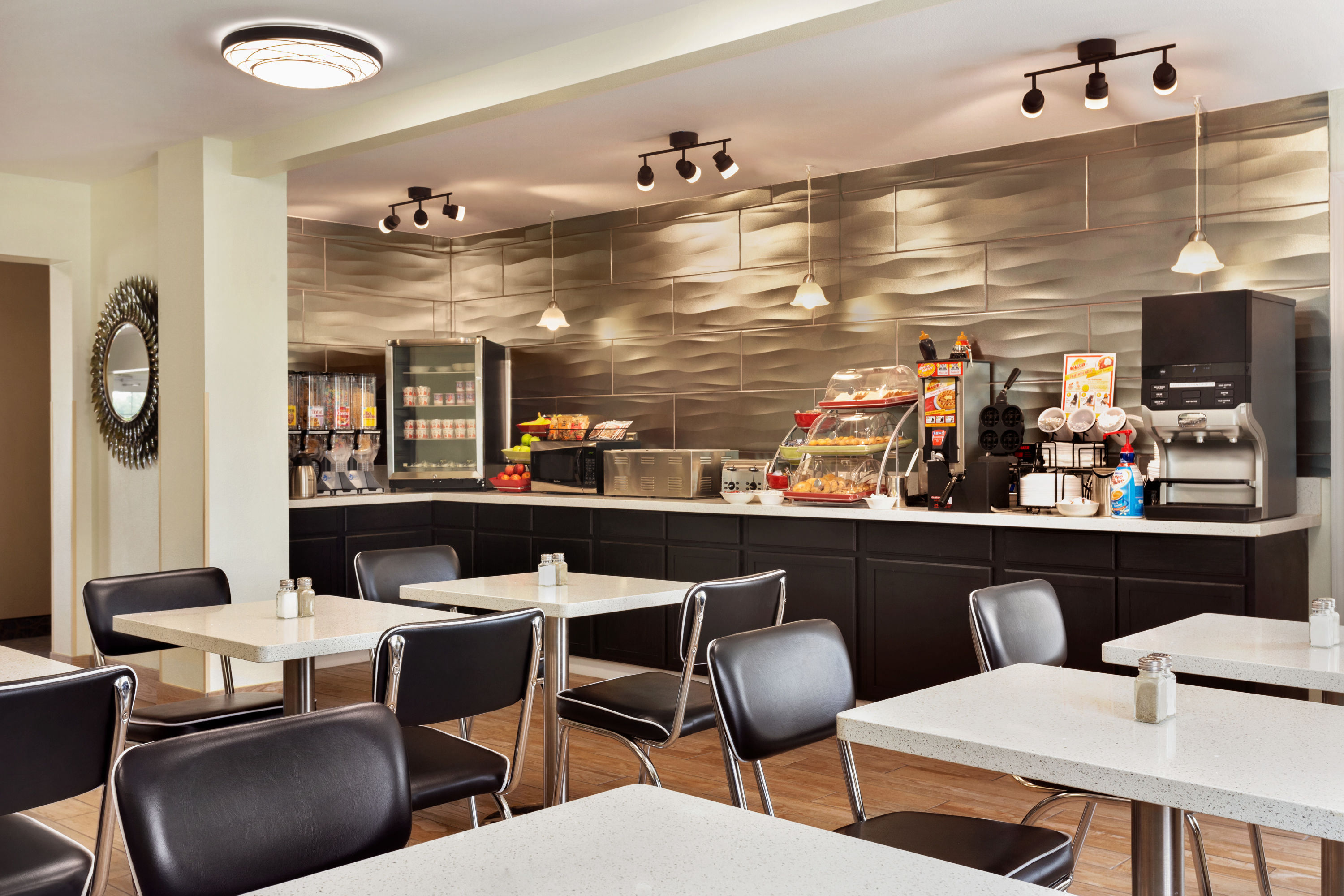 Hawthorn Extended Stay by Wyndham Saint Robert restaurant breakfast area with seating in Saint Robert, Missouri