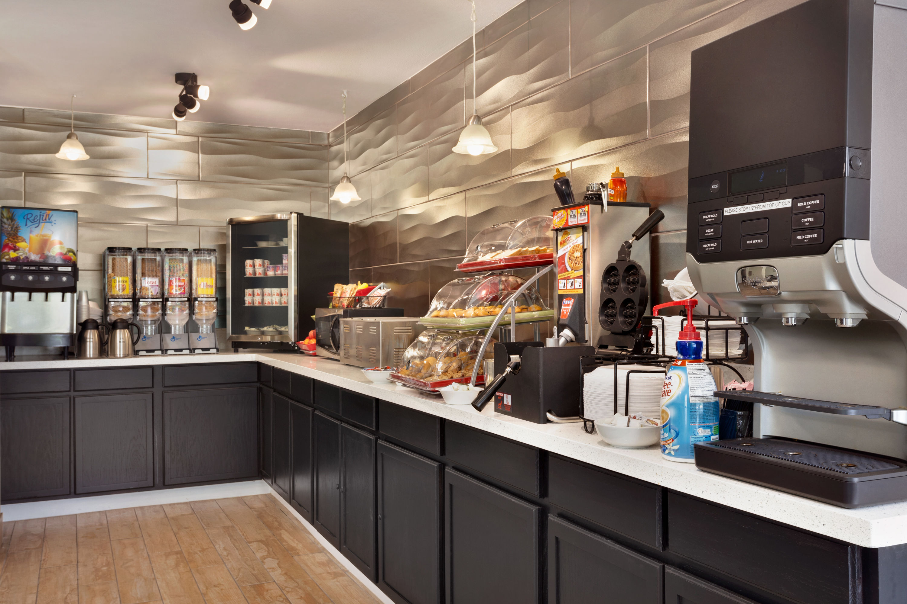 Hawthorn Extended Stay by Wyndham Saint Robert restaurant breakfast area with seating in Saint Robert, Missouri