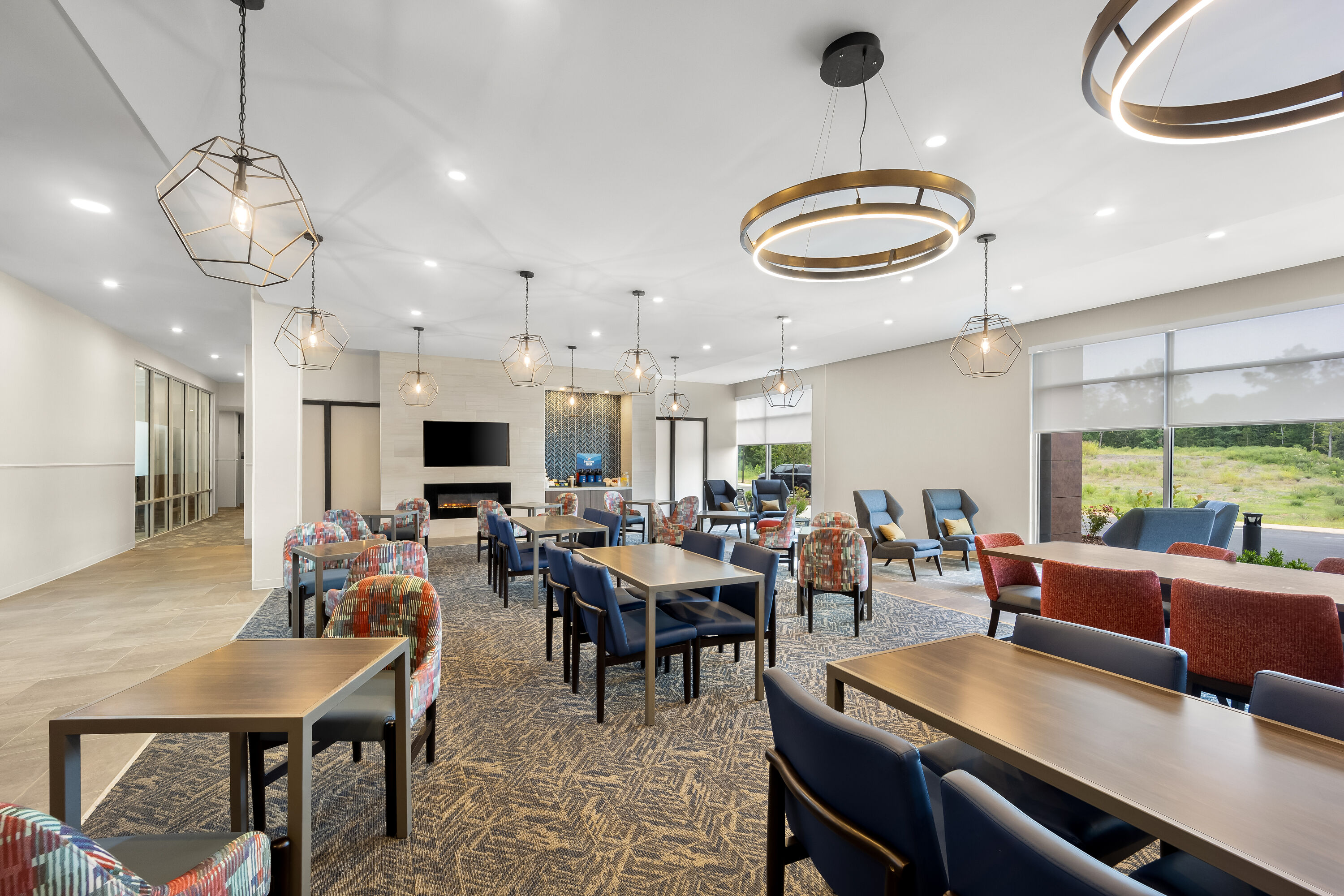 Hawthorn Extended Stay by Wyndham Mebane restaurant breakfast area with seating in Mebane, North Carolina