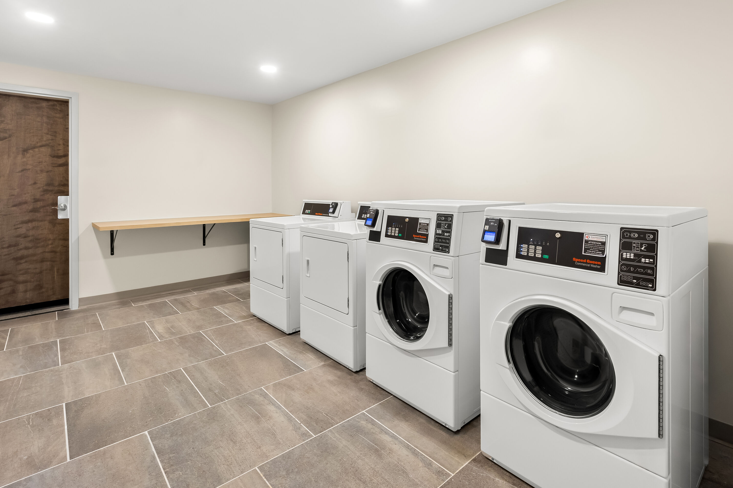 Laundry facilities at Hawthorn Extended Stay by Wyndham Mebane in Mebane, North Carolina