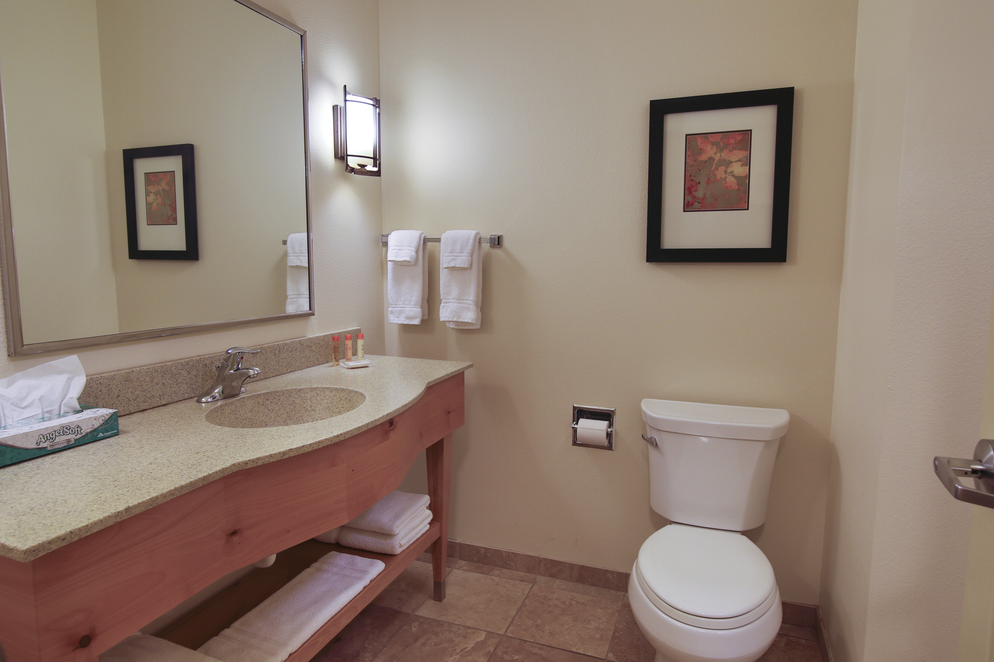 Guest room bath at the Hawthorn Extended Stay by Wyndham Minot in Minot, North Dakota