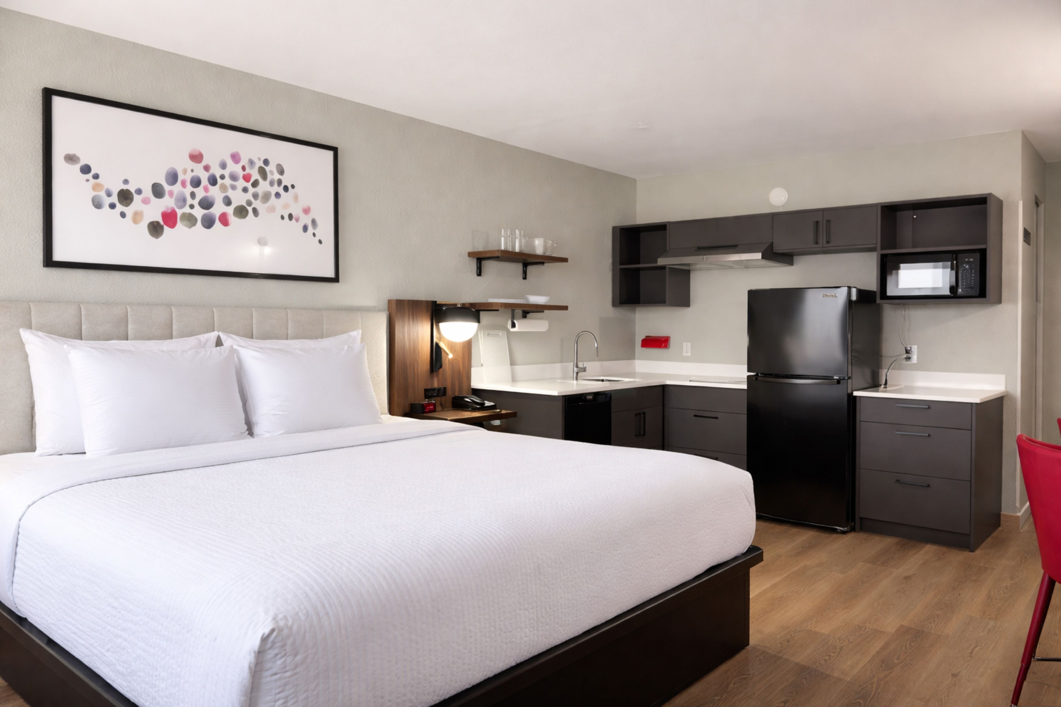 Guest room at the Hawthorn Extended Stay by Wyndham Miamisburg Dayton South in Miamisburg, Ohio