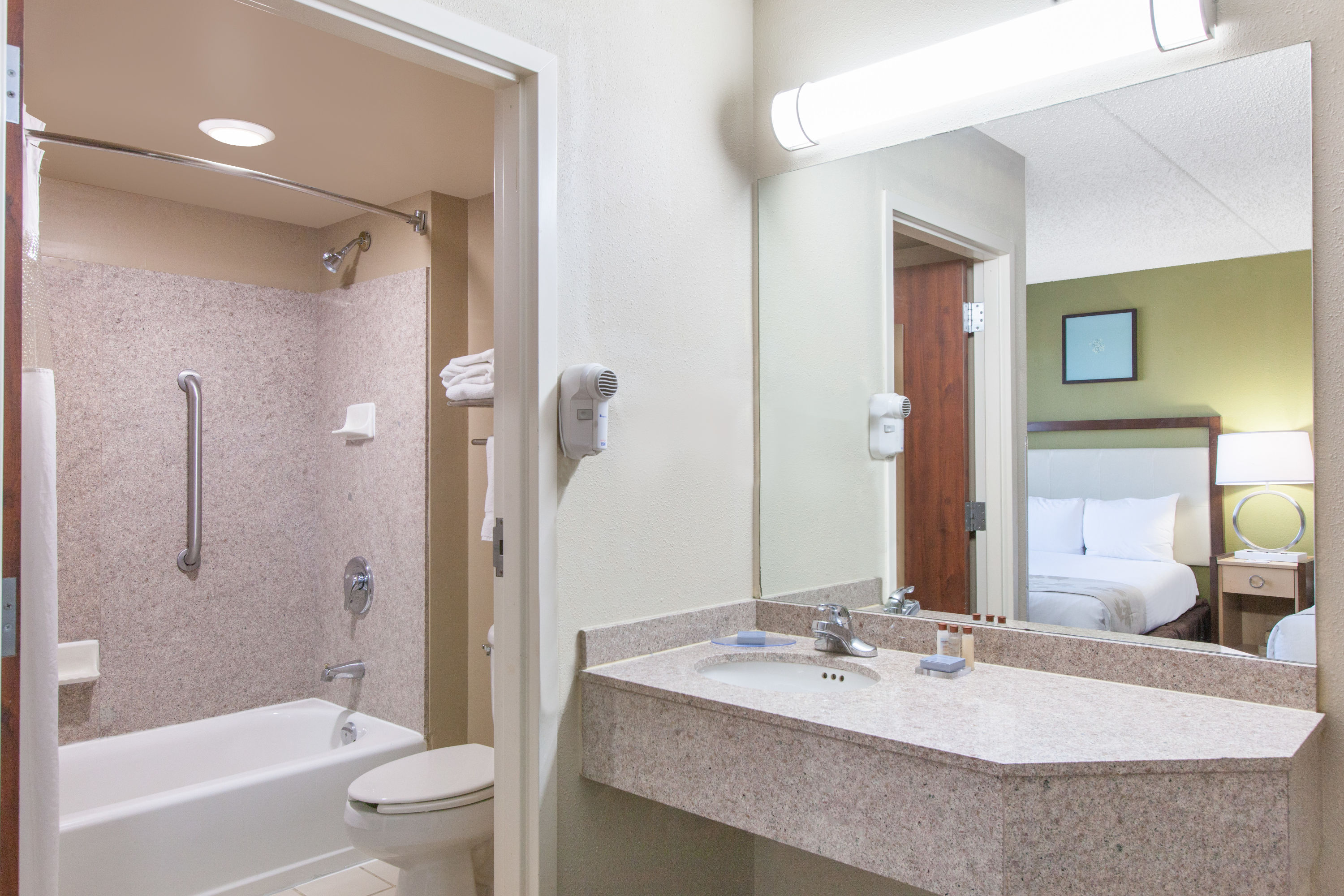 Guest room bath at the Hawthorn Suites by Wyndham Midwest City Tinker AFB in Midwest City, Oklahoma