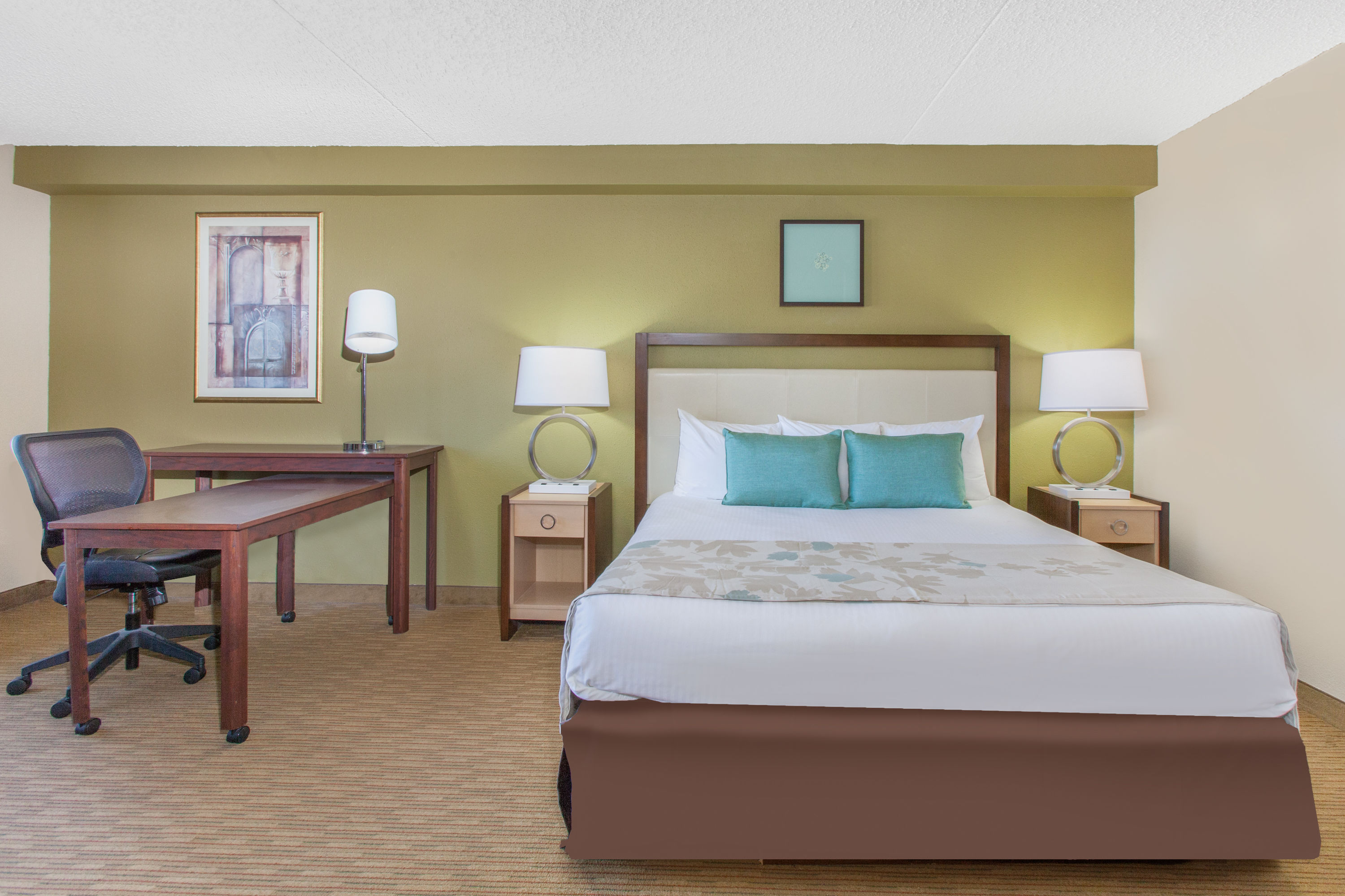 Guest room at the Hawthorn Suites by Wyndham Midwest City Tinker AFB in Midwest City, Oklahoma