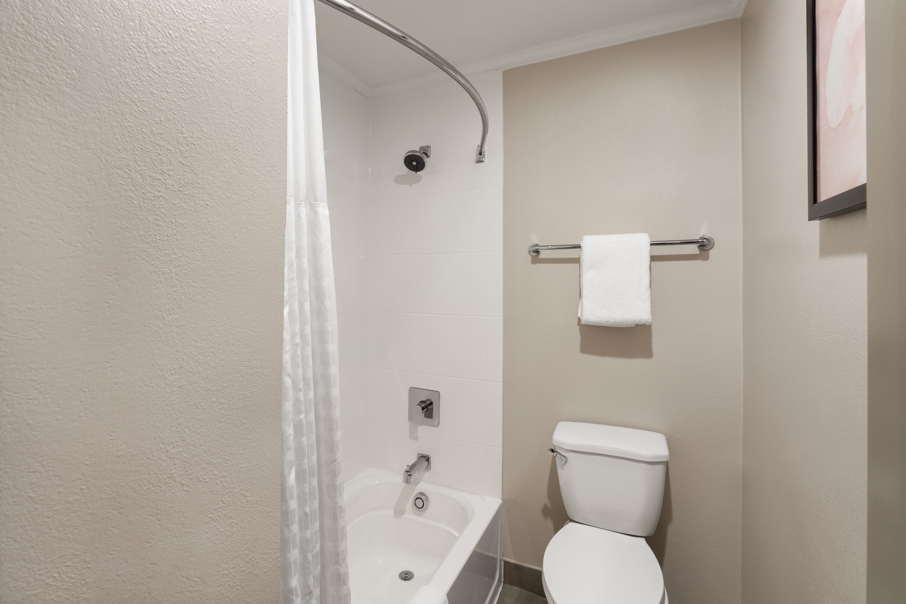 Guest room bath at the Hawthorn Extended Stay by Wyndham Jackson in Jackson, Tennessee