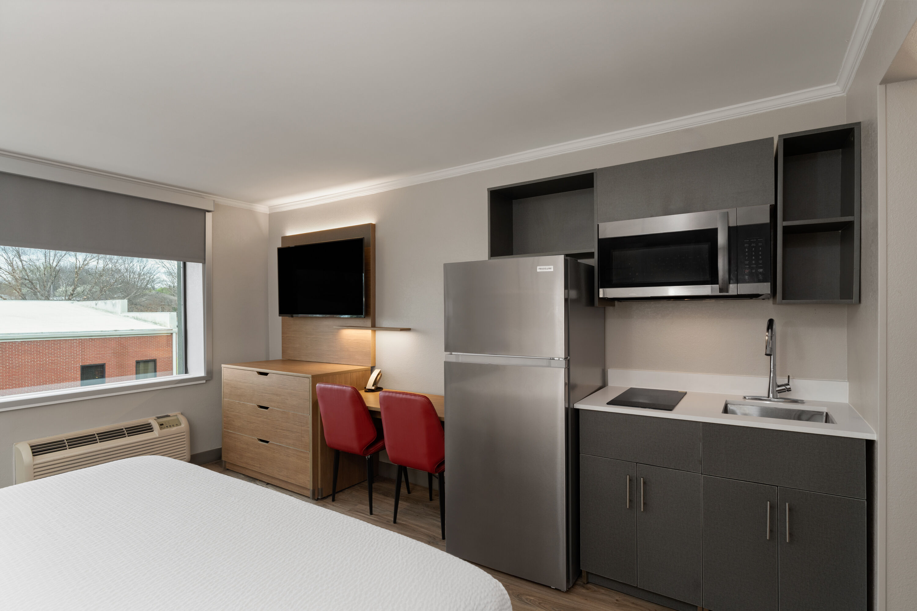 Guest room at the Hawthorn Extended Stay by Wyndham Jackson in Jackson, Tennessee