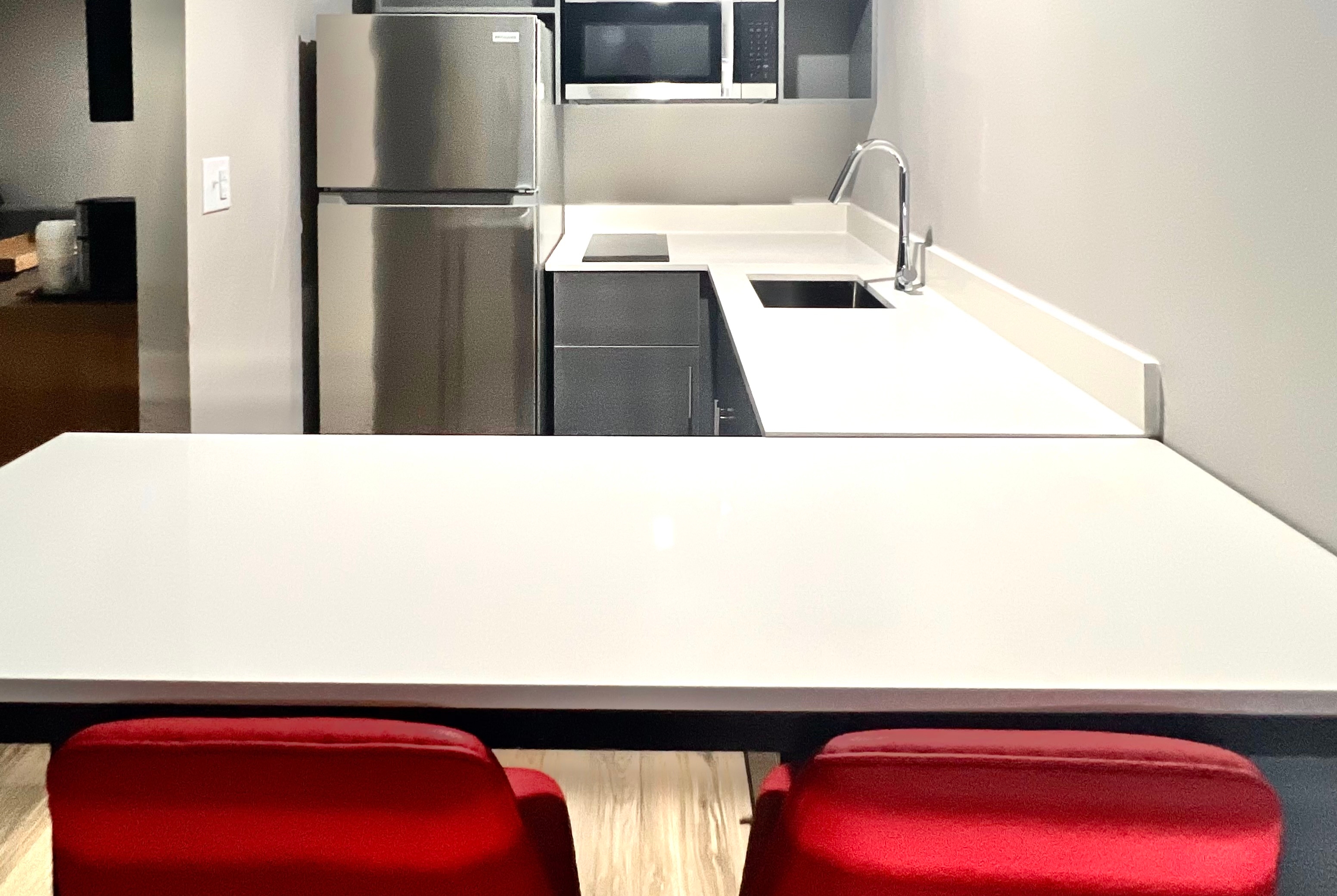 Guest room at the Hawthorn Extended Stay by Wyndham Jackson in Jackson, Tennessee