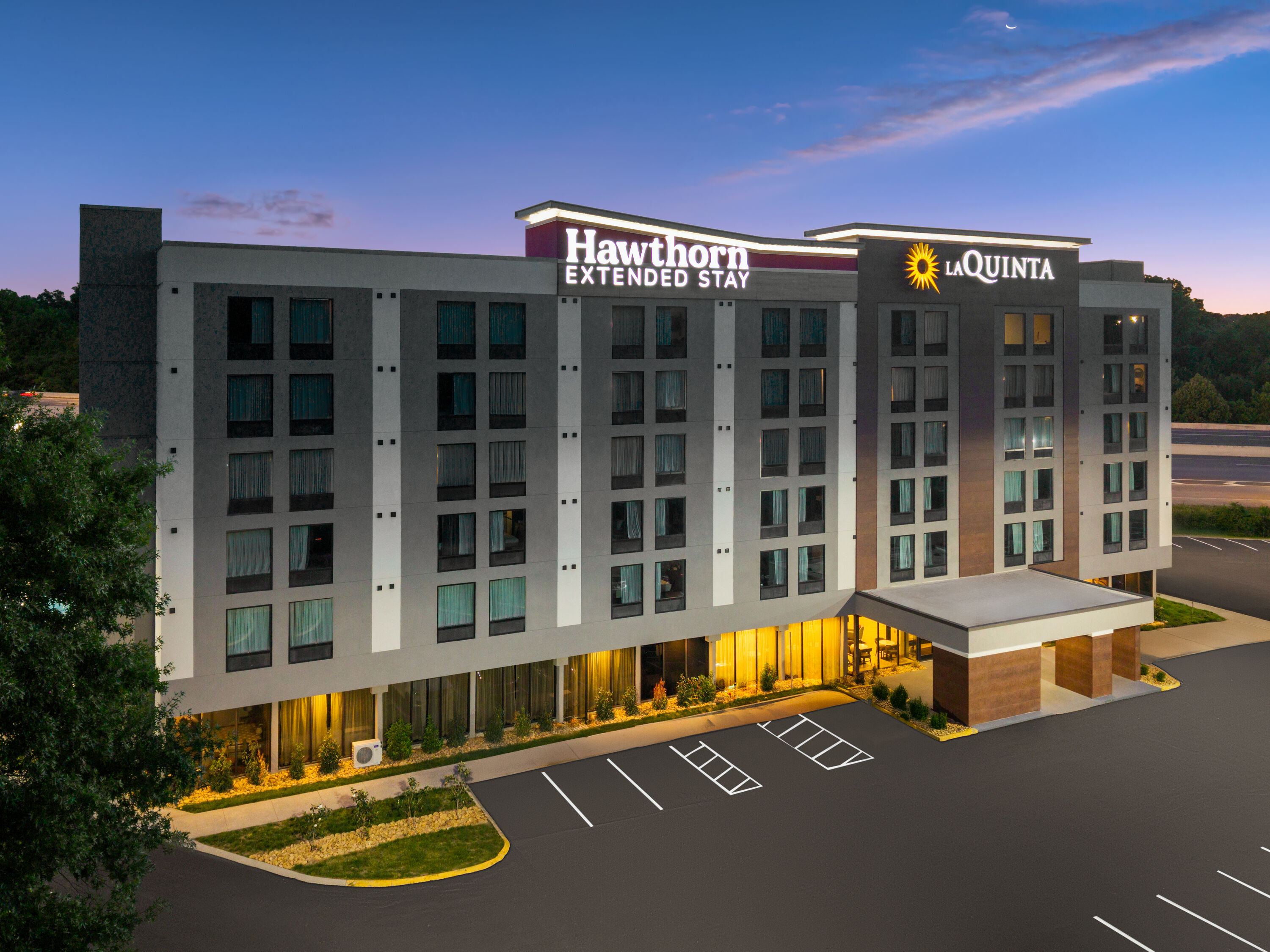 Exterior Dusk Image of Hawthorn Extended Stay by Wyndham Nashville Airport/Opryland hotel in Nashville, Tennessee
