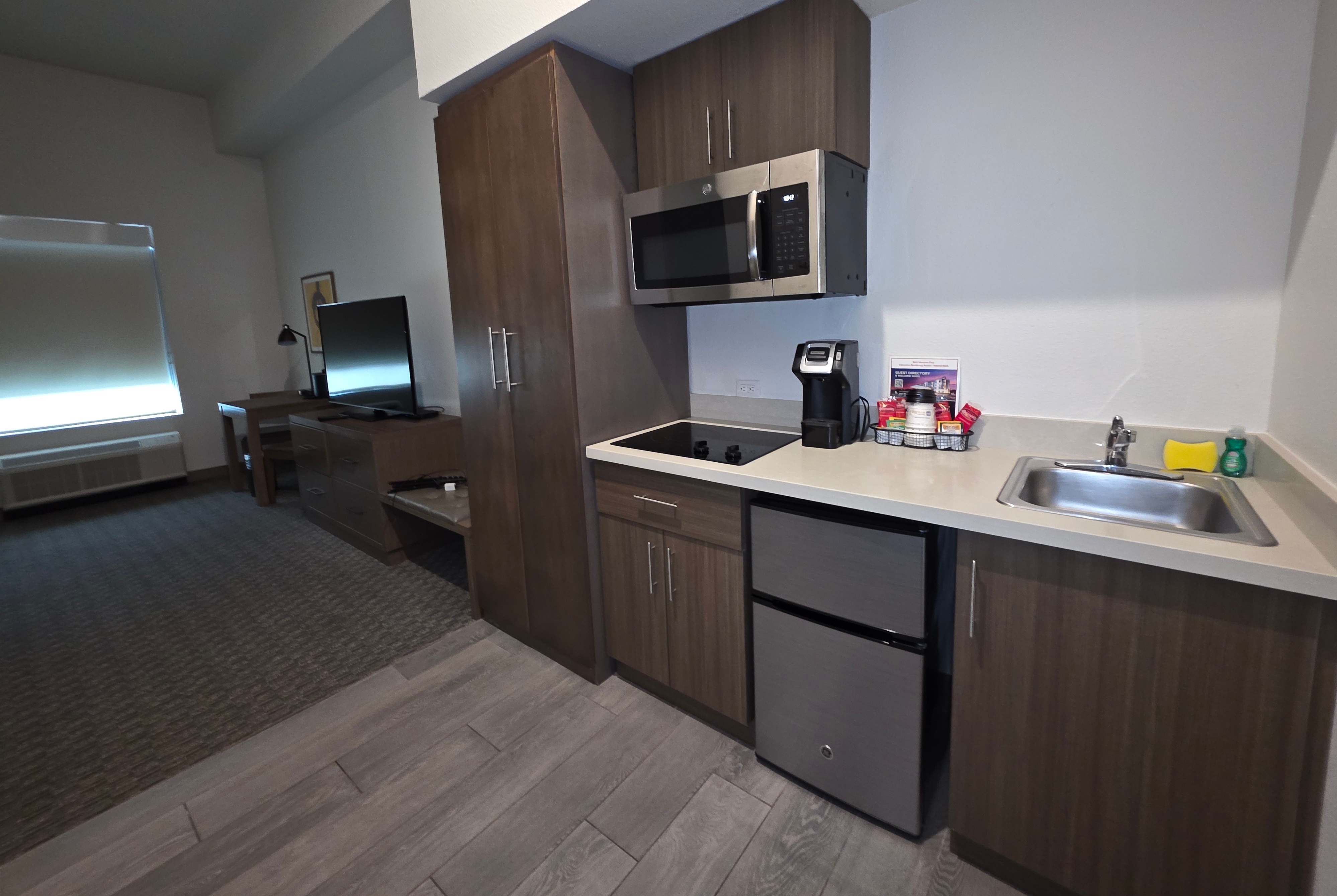 Guest room at the Hawthorn Extended Stay Austin North in Austin, Texas