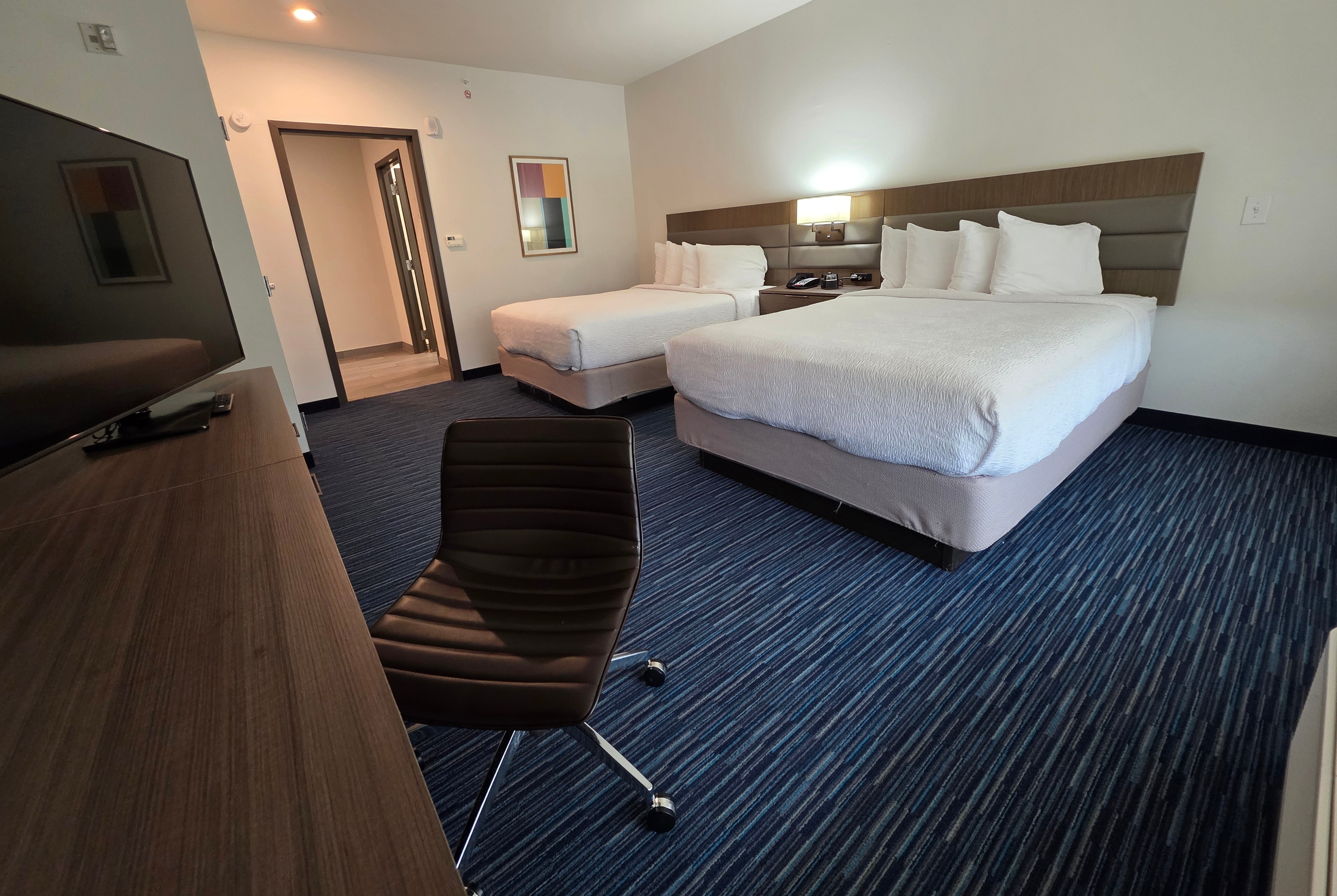 Guest room at the Hawthorn Extended Stay Austin North in Austin, Texas