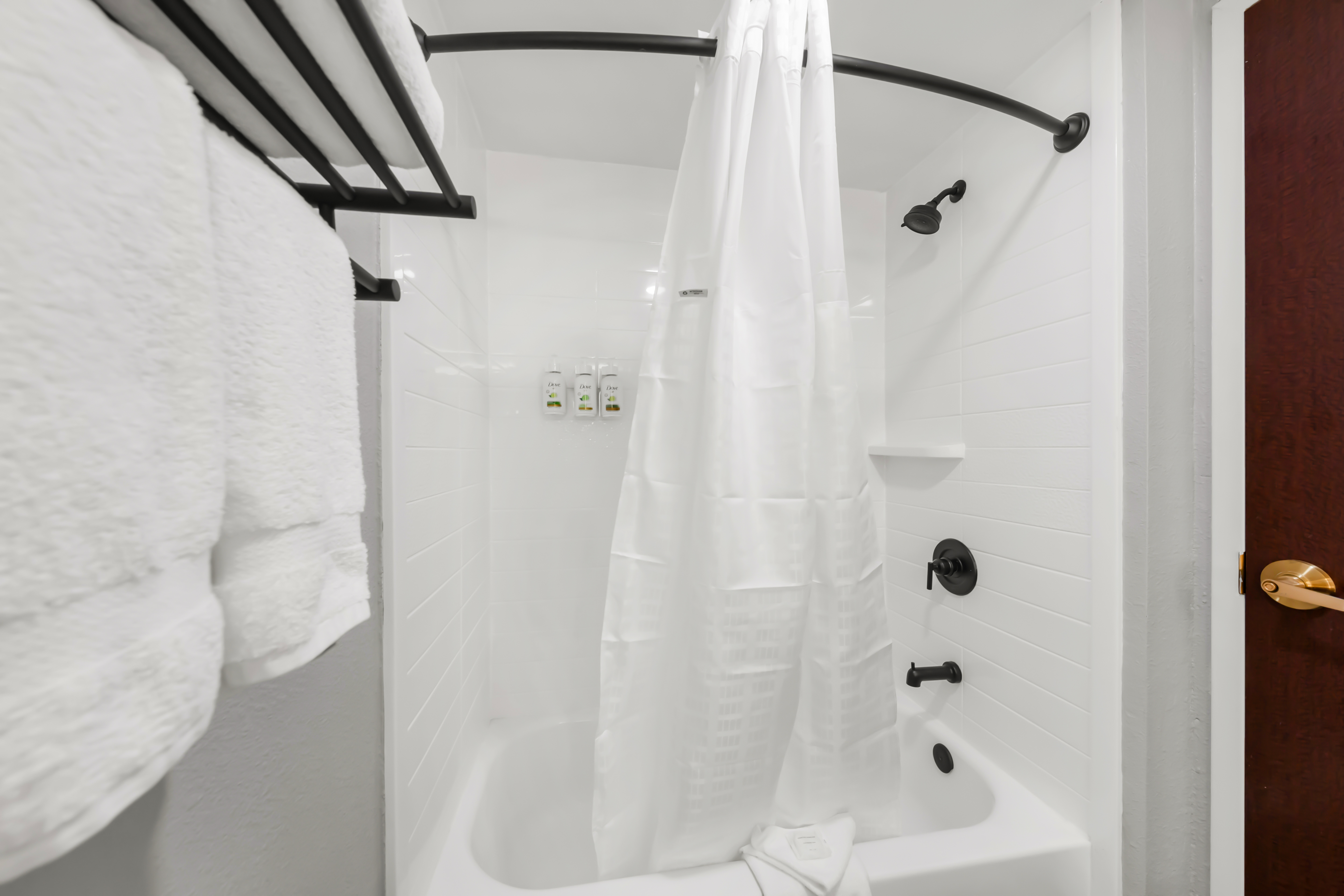 Guest room at the Hawthorn Extended Stay by Wyndham College Station in College Station, Texas