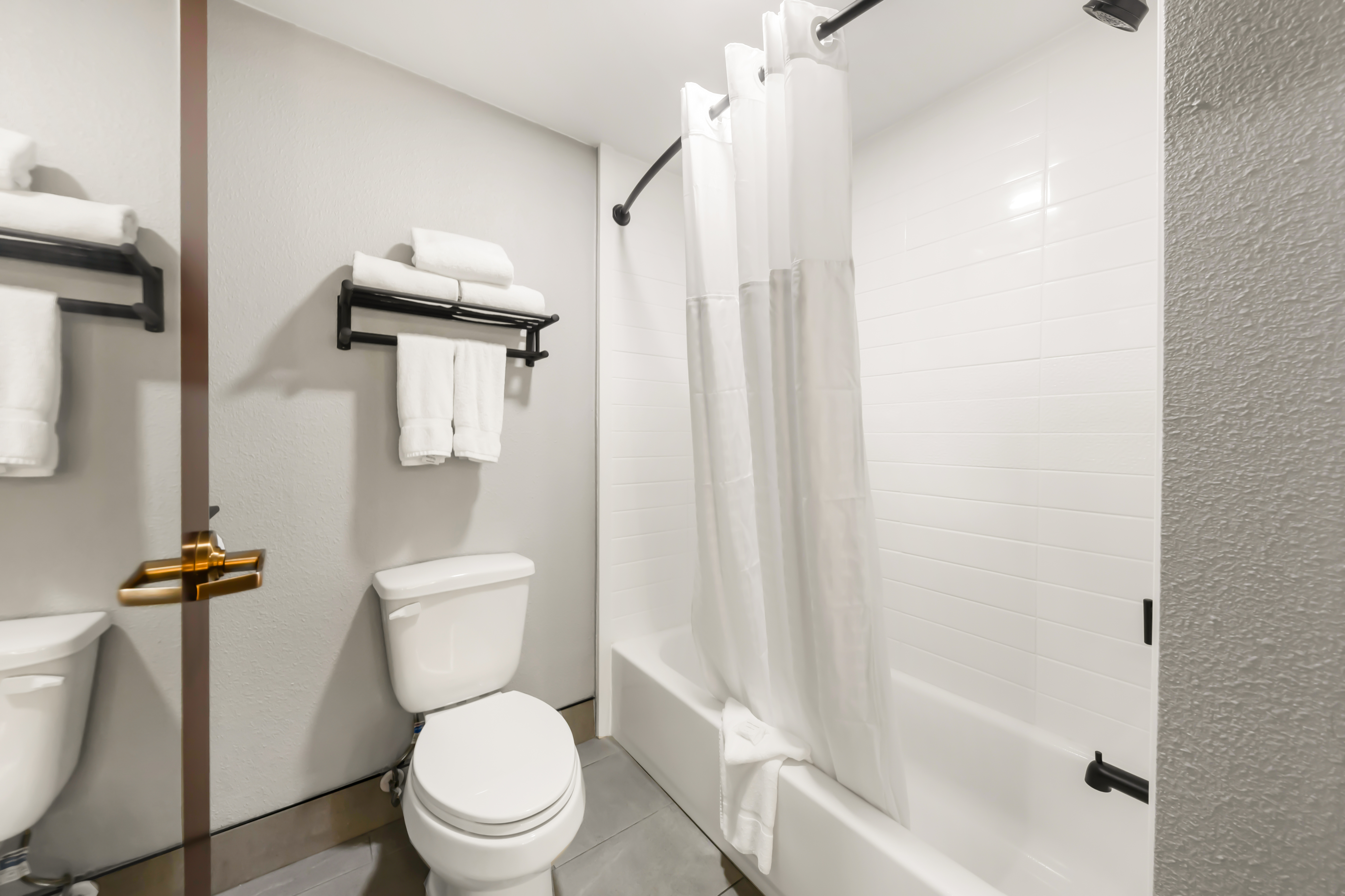 Guest room at the Hawthorn Extended Stay by Wyndham College Station in College Station, Texas