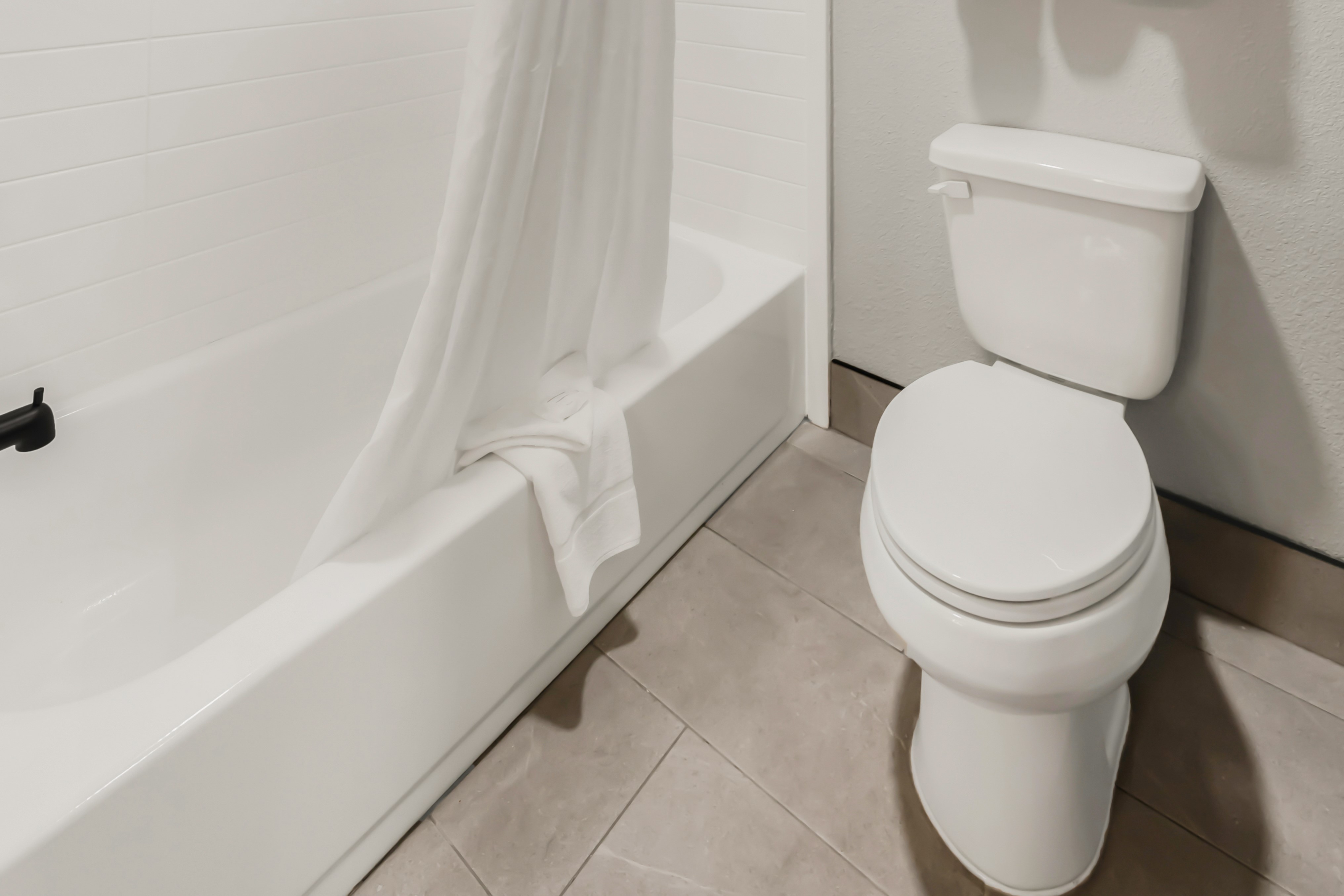 Guest room at the Hawthorn Extended Stay by Wyndham College Station in College Station, Texas