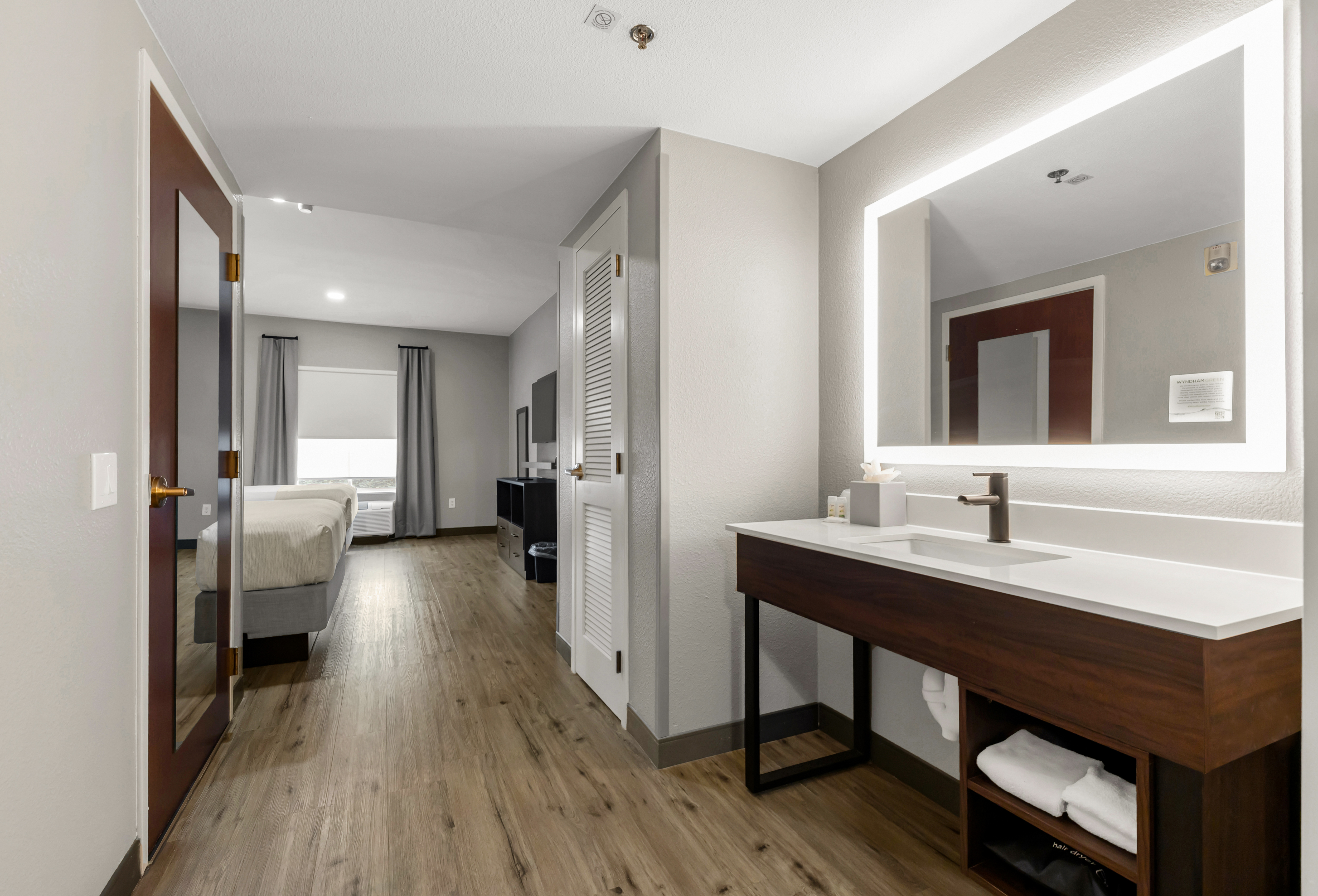 Guest room at the Hawthorn Extended Stay by Wyndham College Station in College Station, Texas