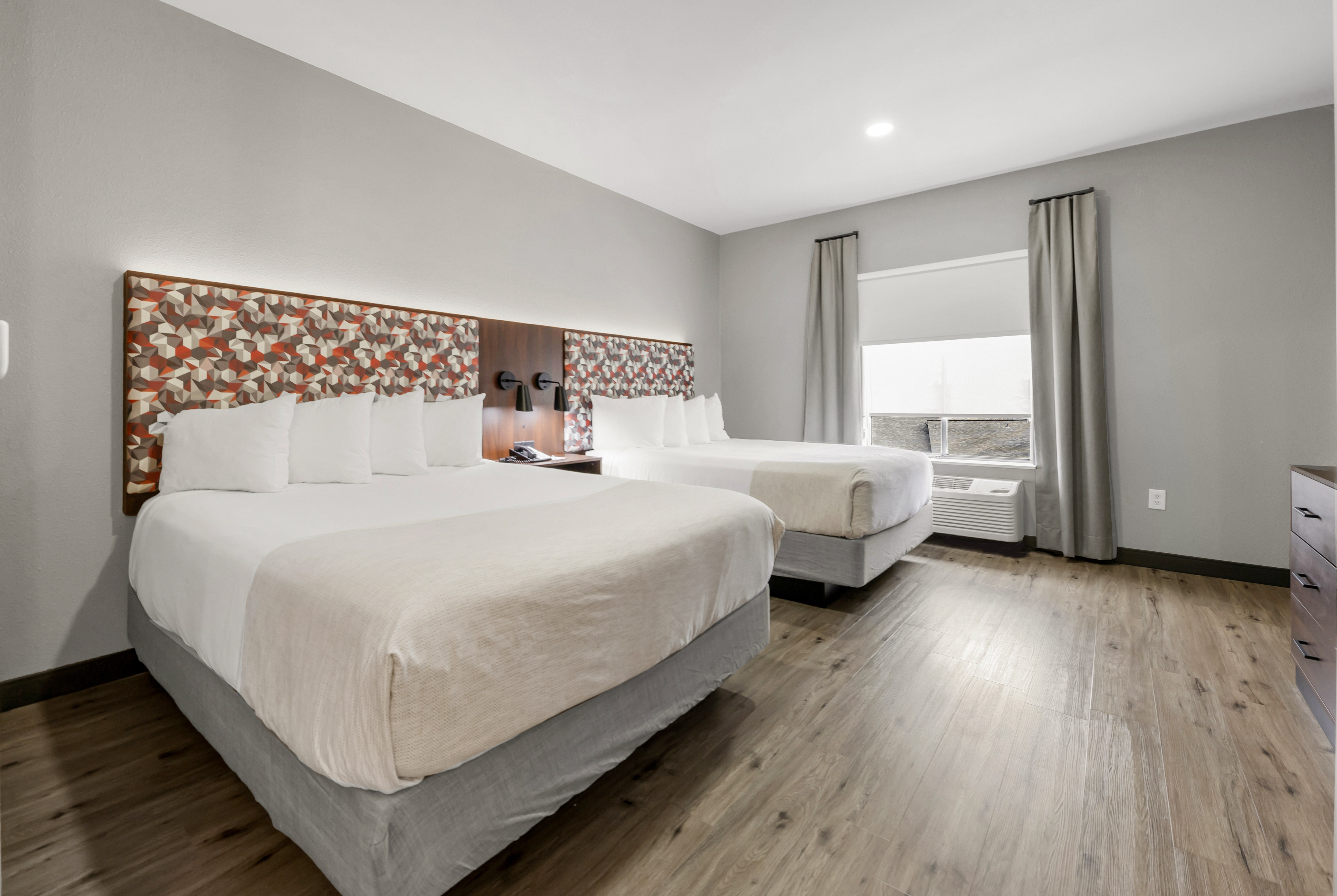 Guest room at the Hawthorn Extended Stay by Wyndham College Station in College Station, Texas