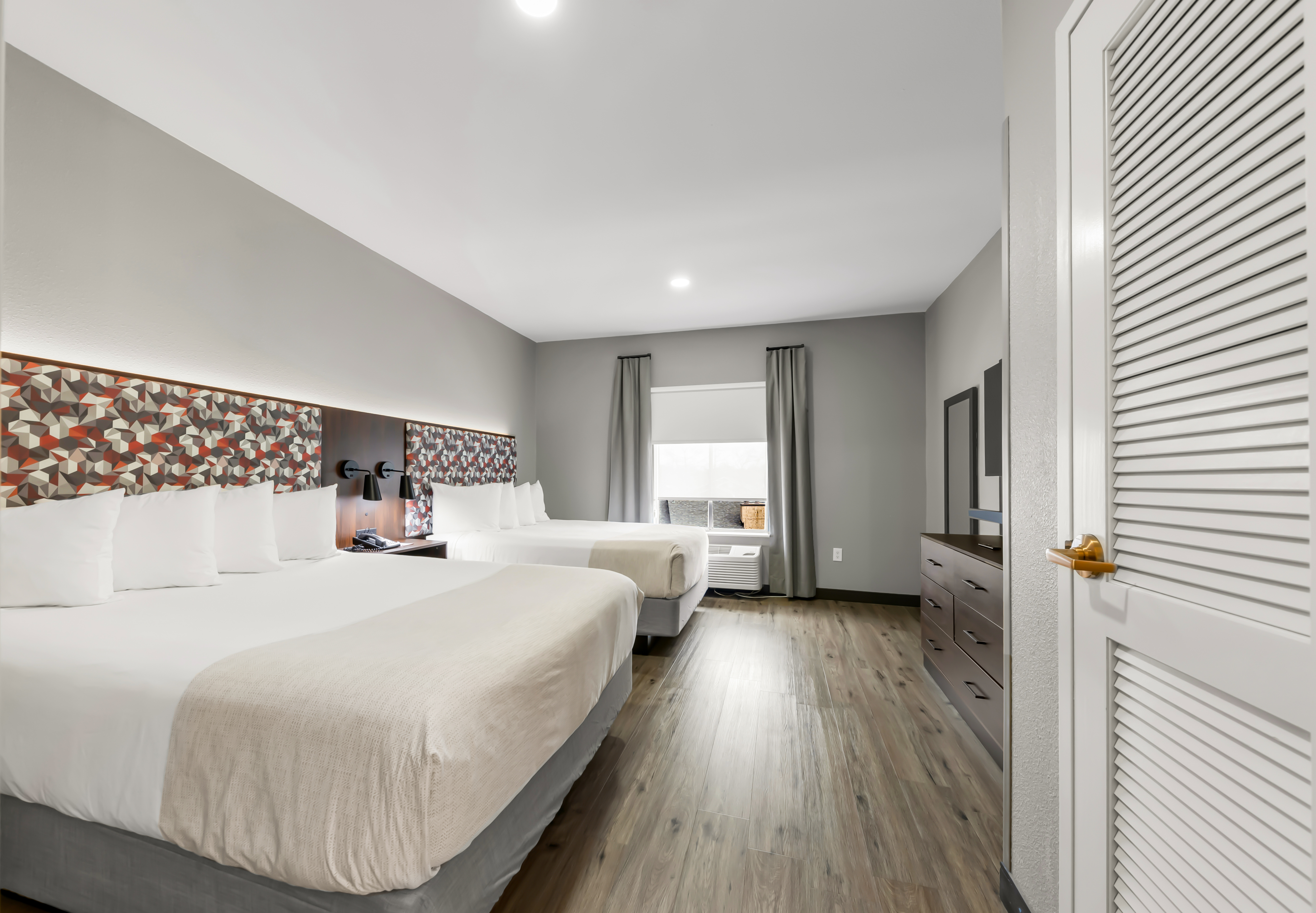 Guest room at the Hawthorn Extended Stay by Wyndham College Station in College Station, Texas