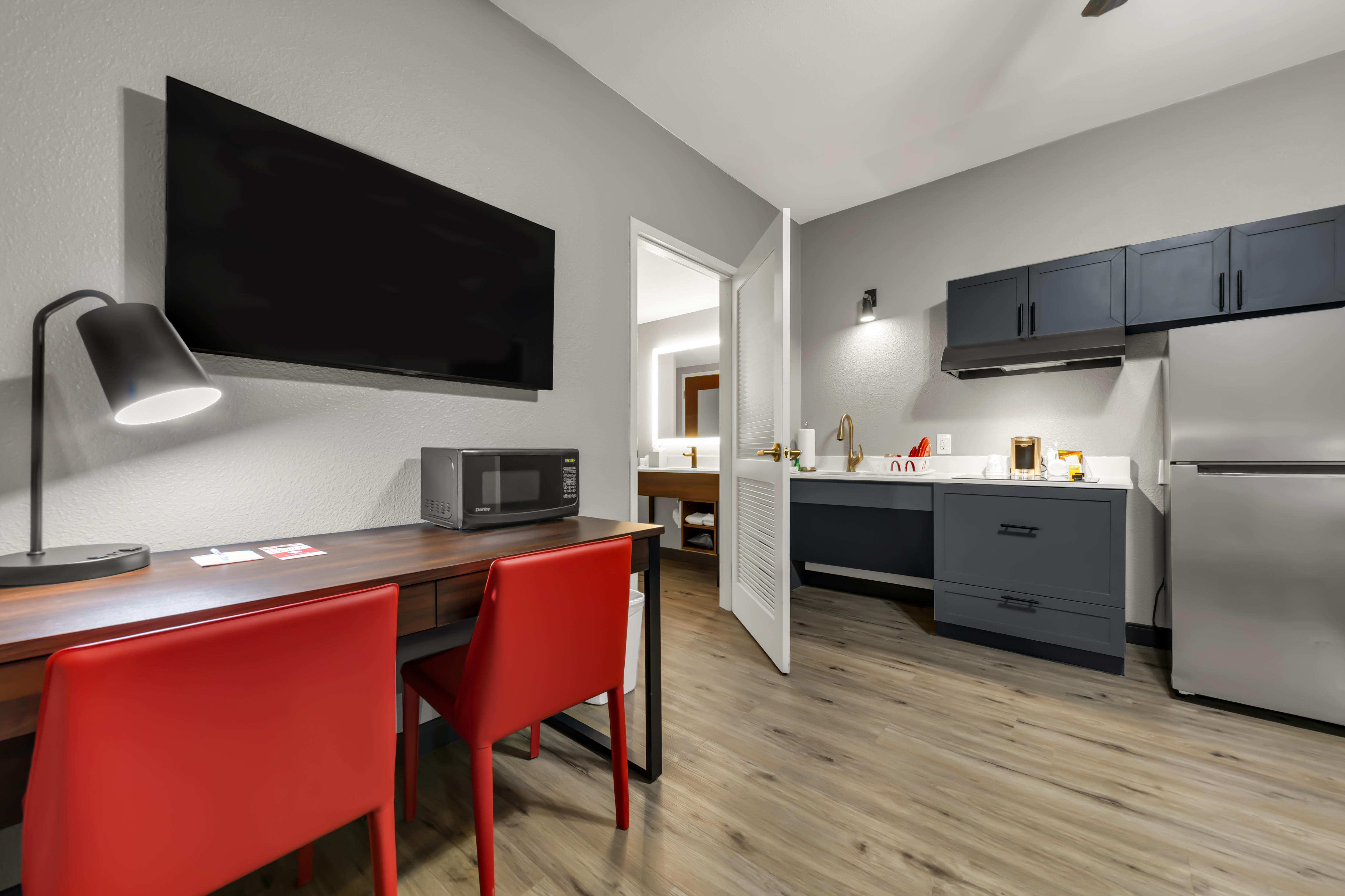 Guest room at the Hawthorn Extended Stay by Wyndham College Station in College Station, Texas