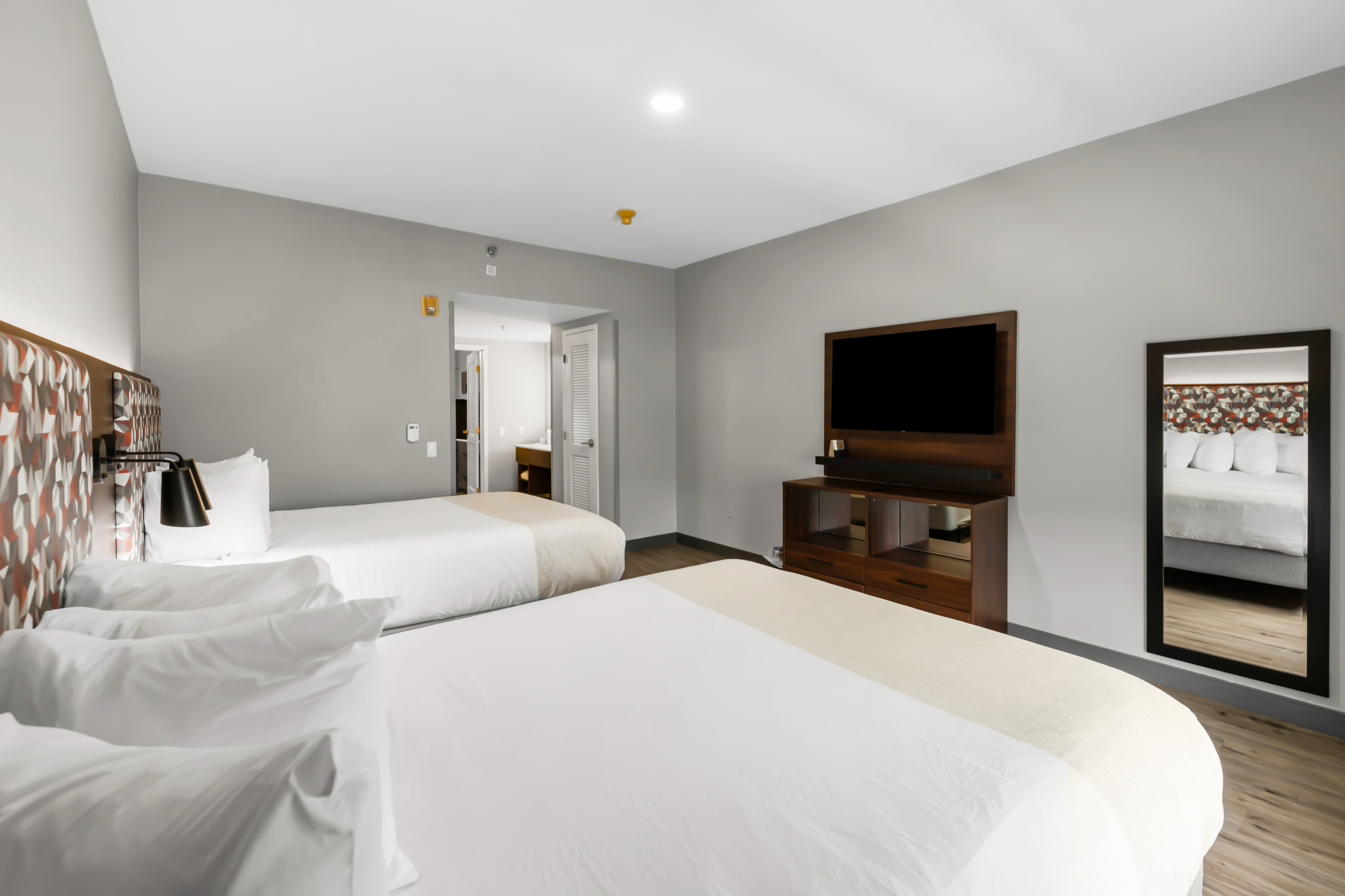 Guest room at the Hawthorn Extended Stay by Wyndham College Station in College Station, Texas