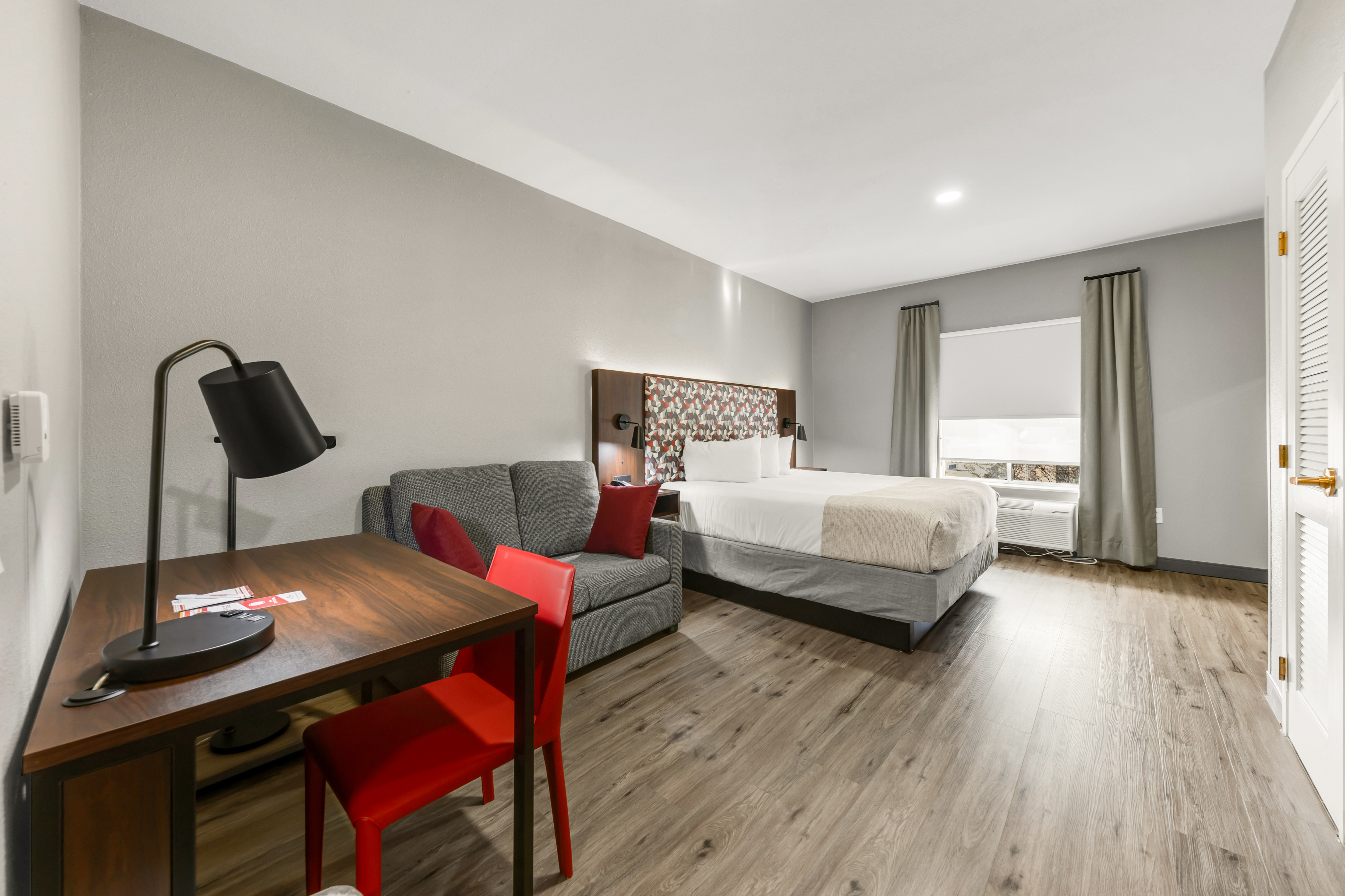 Guest room at the Hawthorn Extended Stay by Wyndham College Station in College Station, Texas